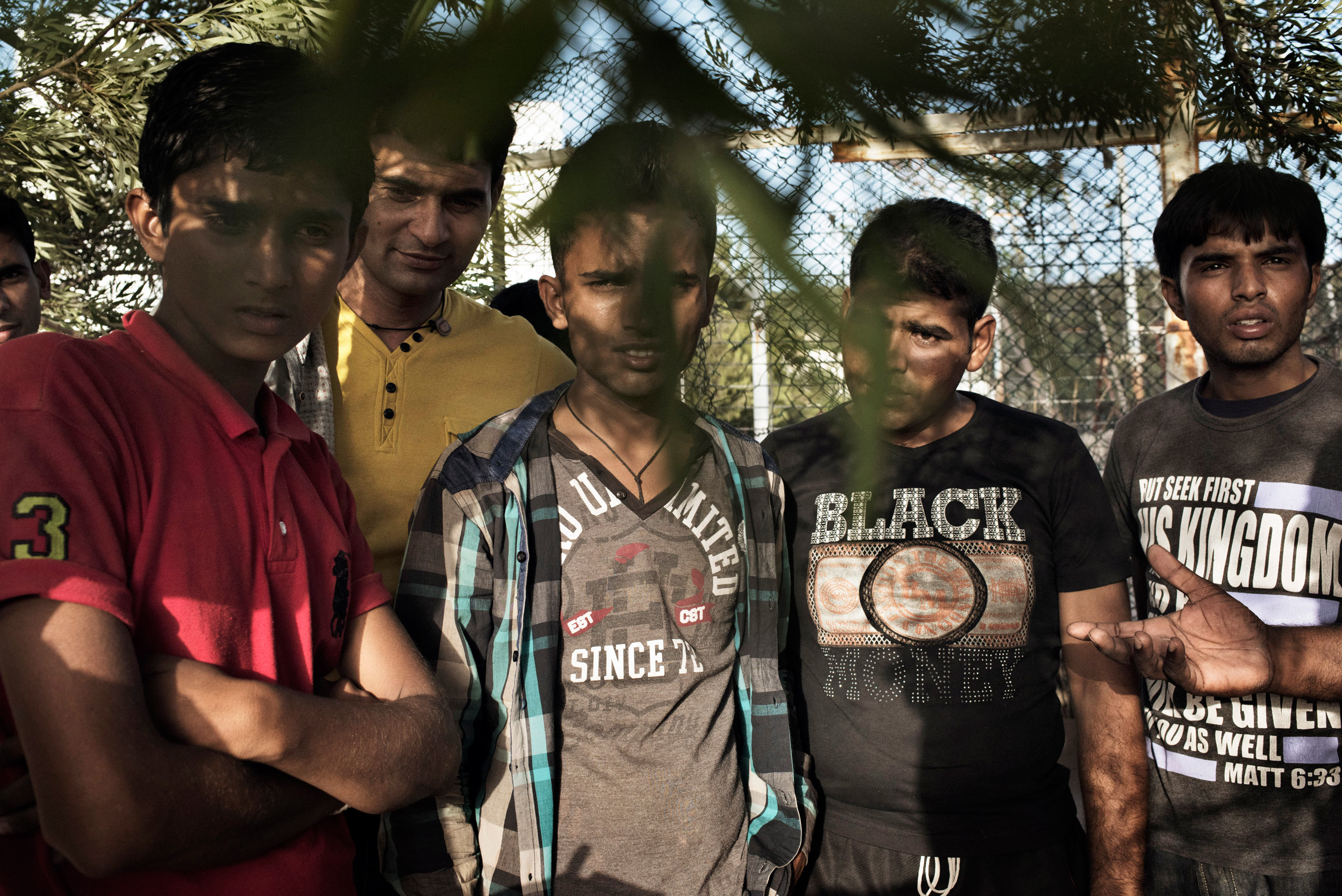 A group of Pakistani men wait at a park next to the bus station in Bodrum,  waiting to make the journey to Greece on a dinghy. Bodrum, Turkey, Sept. 16, 2015.