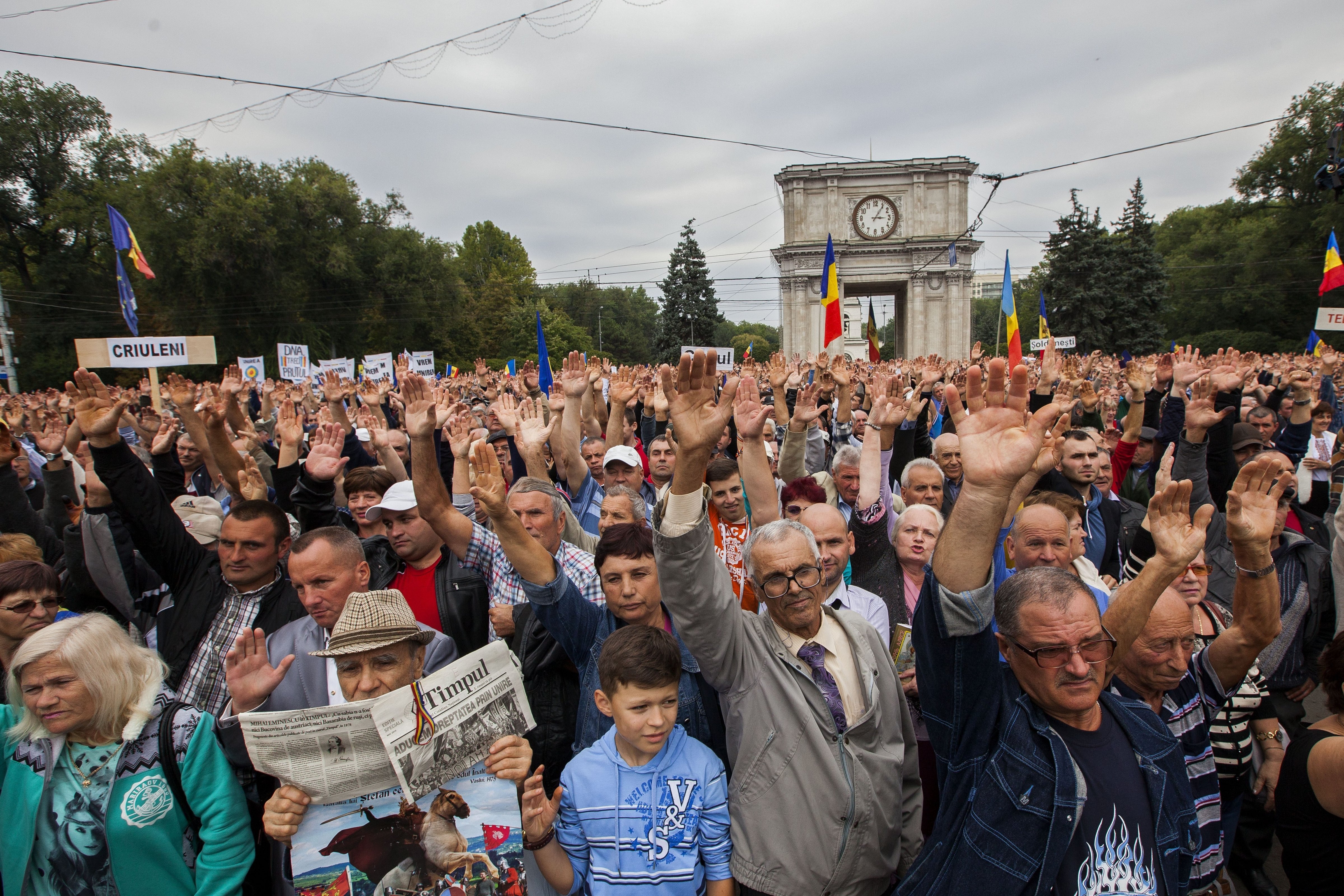 People take part in a rally demanding the resignation of President Nicolae Timofti in Chisinau, Moldova on September 13, 2015.