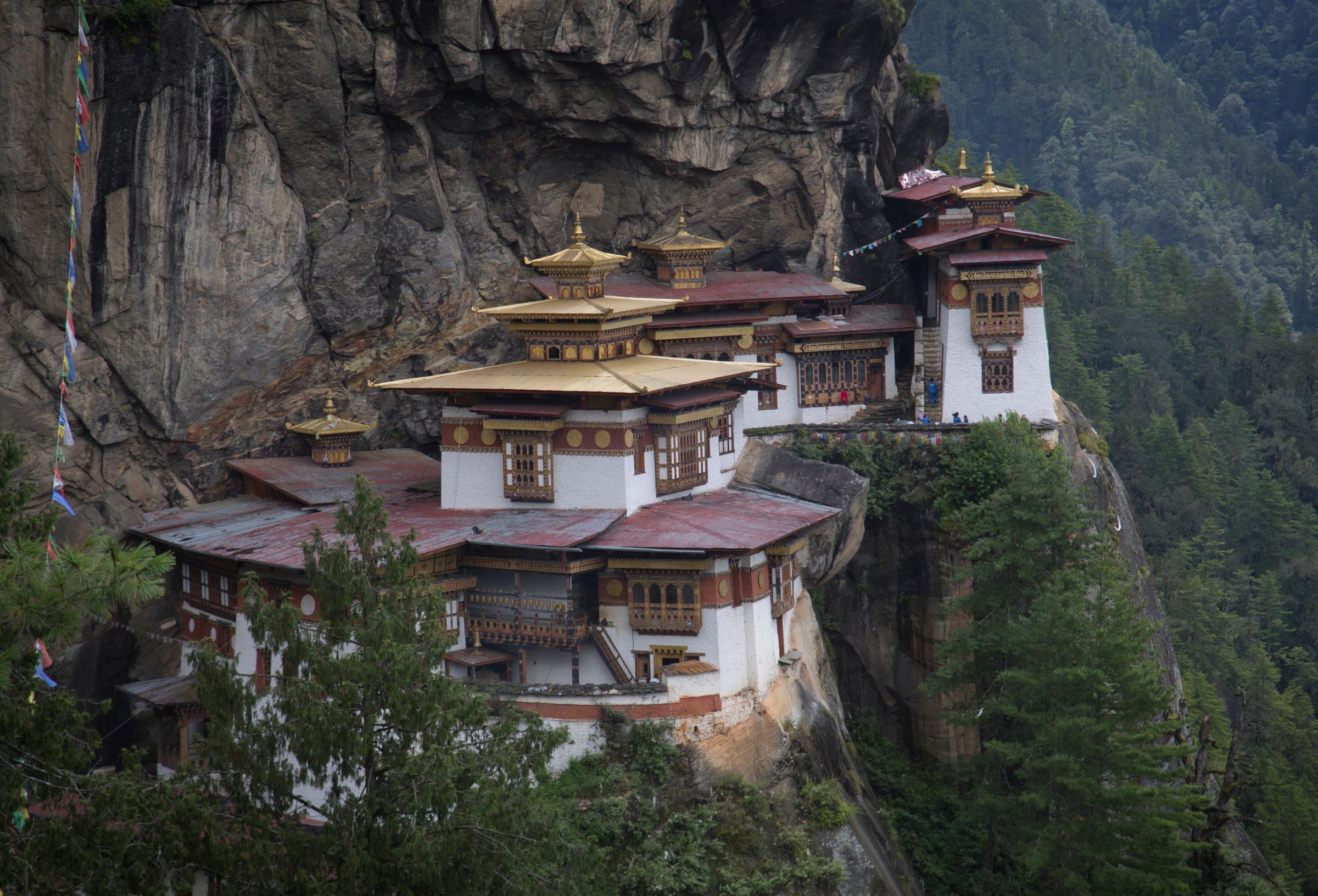 Paro, Bhutan - September 7, 2013 : Taktsang Palphug Monastery, or The Tiger's Nest Temple, near Paro, Bhutan on September 7, 2013. Bhutan, a Buddhist kingdom which allows only a limited number of travelers since it opened to foreigners in 1974 in order to preserve its fragile environment and culture, has become an increasingly popular destination for international tourists.  (Photo by Kuni Takahashi/Getty Images)