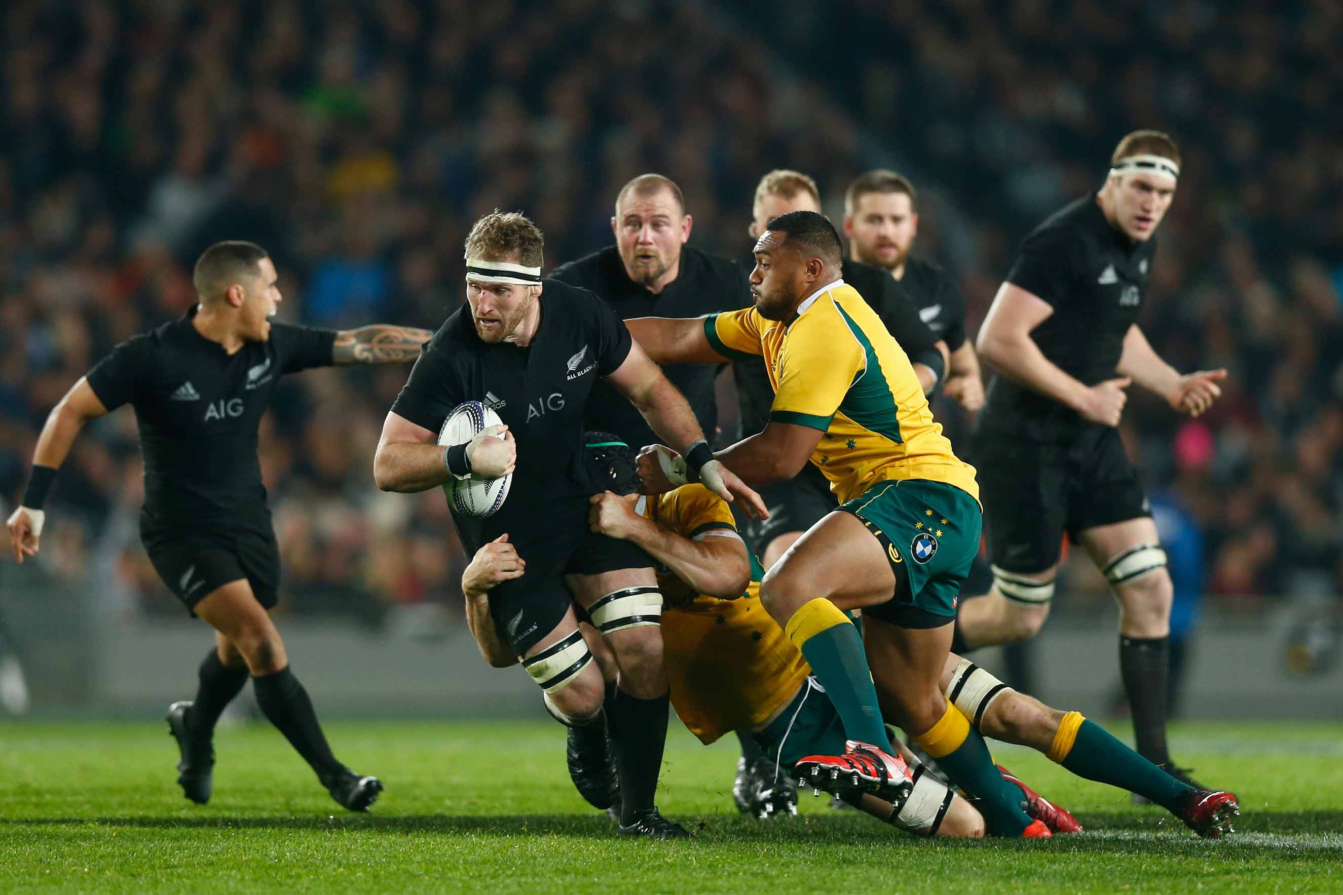 Kieran Read of the All Blacks is tackled  during The Rugby Championship, Bledisloe Cup match between the New Zealand All Blacks and the Australian Wallabies at Eden Park on Aug. 15, 2015 in Auckland. (Phil Walter—Getty Images)