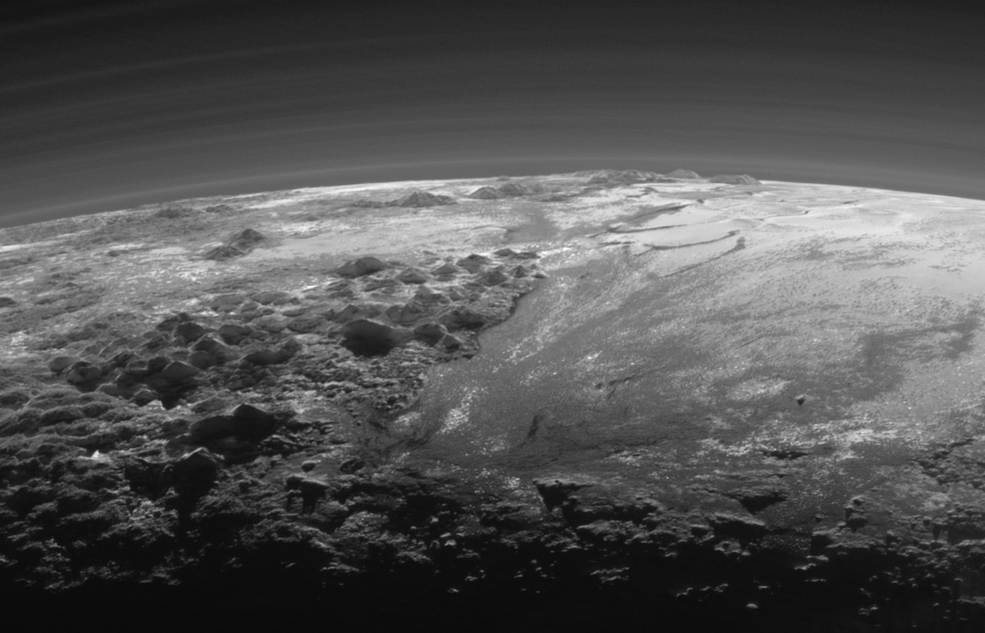 A closer look on the majestic mountains and frozen plains of Pluto as captured by NASA's New Horizons spacecraft on July 14, 2015. (NASA/JHUAPL/SwRI)