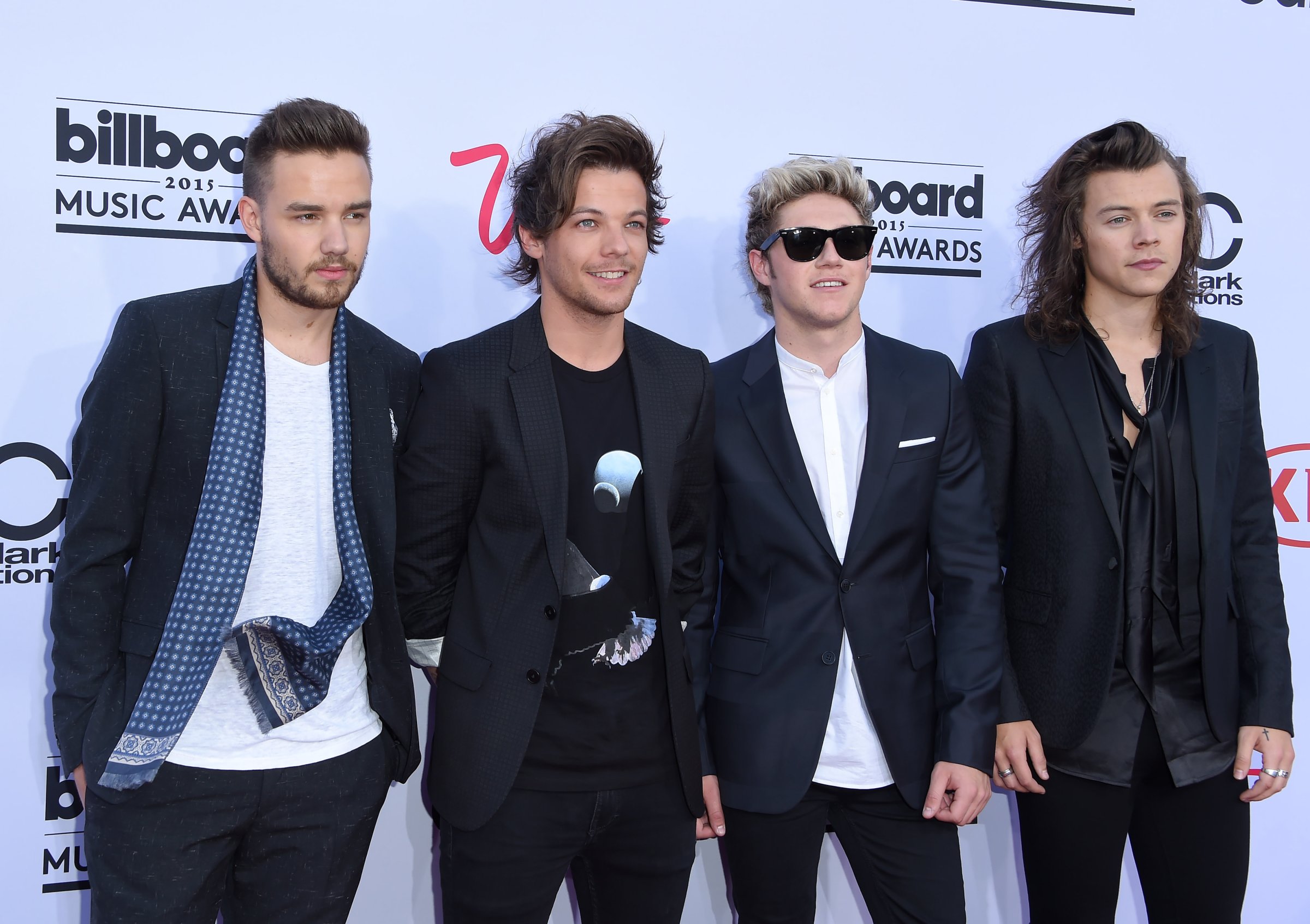 (L-R) Singers Liam Payne, Louis Tomlinson, Niall Horan and Harry Styles of One Direction at the 2015 Billboard Music Awards in Las Vegas on May 17, 2015.