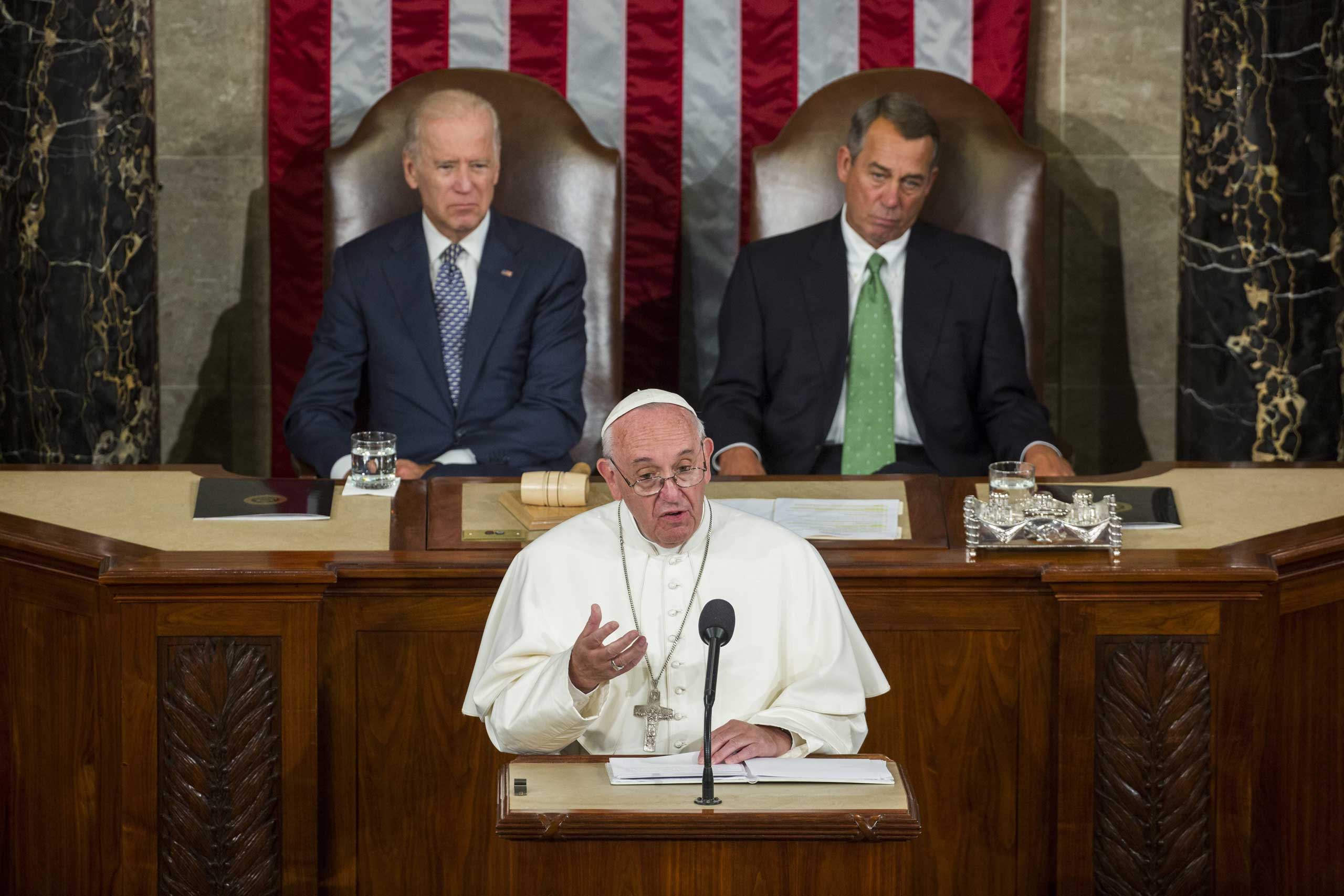 <b>Pope Francis</b>, addressed a joint meeting of the U.S. Congress with with Vice President Joe Biden and Speaker of the House John Boehner in the House Chamber of the U.S. Capitol in Washington, on Sept. 24, 2015, urging legislators to work together to solve problems and avoid polarization (Jim Lo Scalzo—EPA)