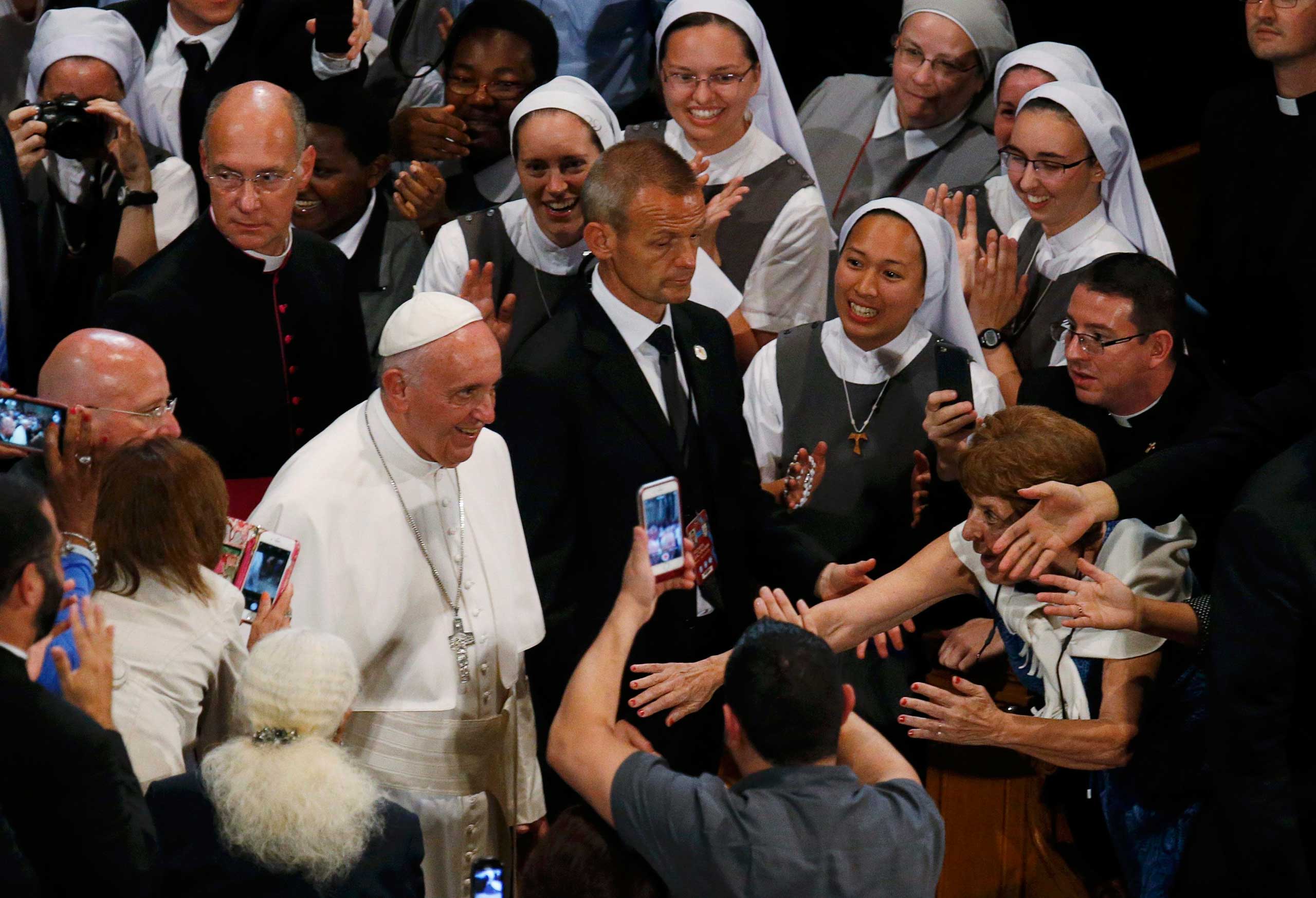 Pope Francis  greets and blesses seminarians, novices, religious guests inside the Basilica of the National Shrine of the Immaculate Conception in Washington, on Sept. 23, 2015.