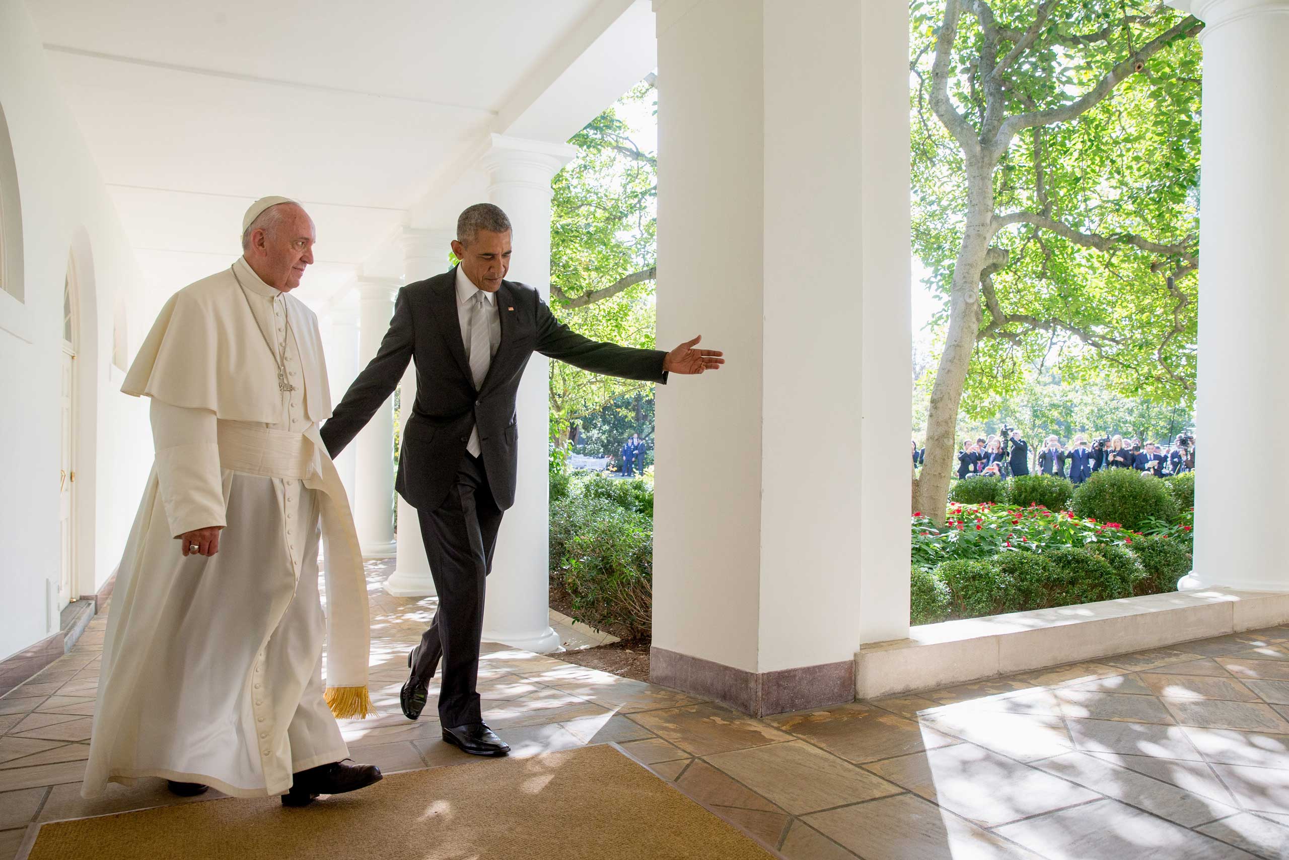 President Barack Obama and Pope Francis walk down the Colonnade before meeting in the Oval Office of the White House in Washington, on Sept. 23, 2015.
