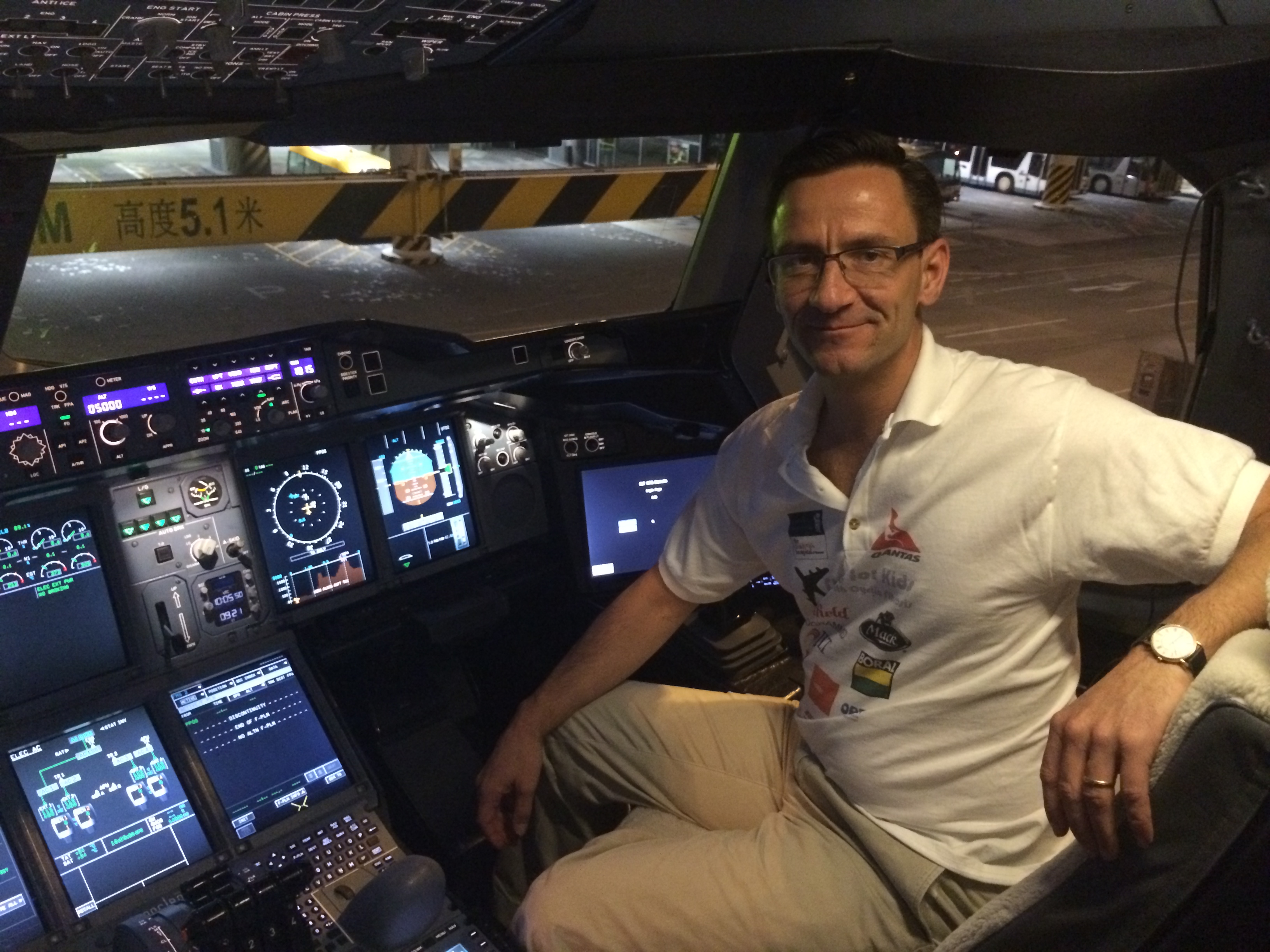 This undated photo shows Matthias Fuchs in the cockpit of an Airbus A380 at Hong Kong International Airport. (Matthias Fuchs)