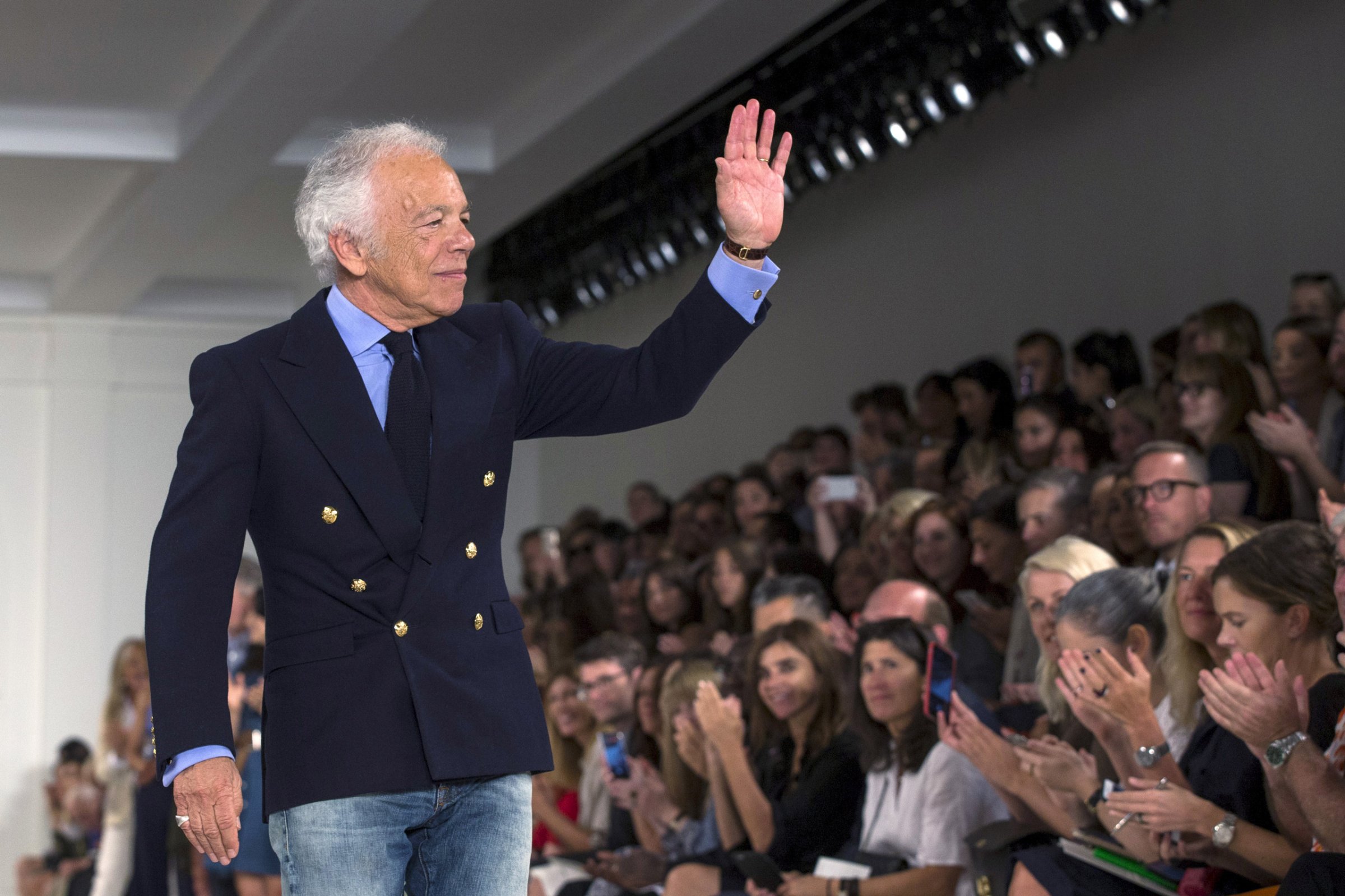Designer Ralph Lauren greets the crowd after presenting his Spring/Summer 2016 collection during New York Fashion Week in New York