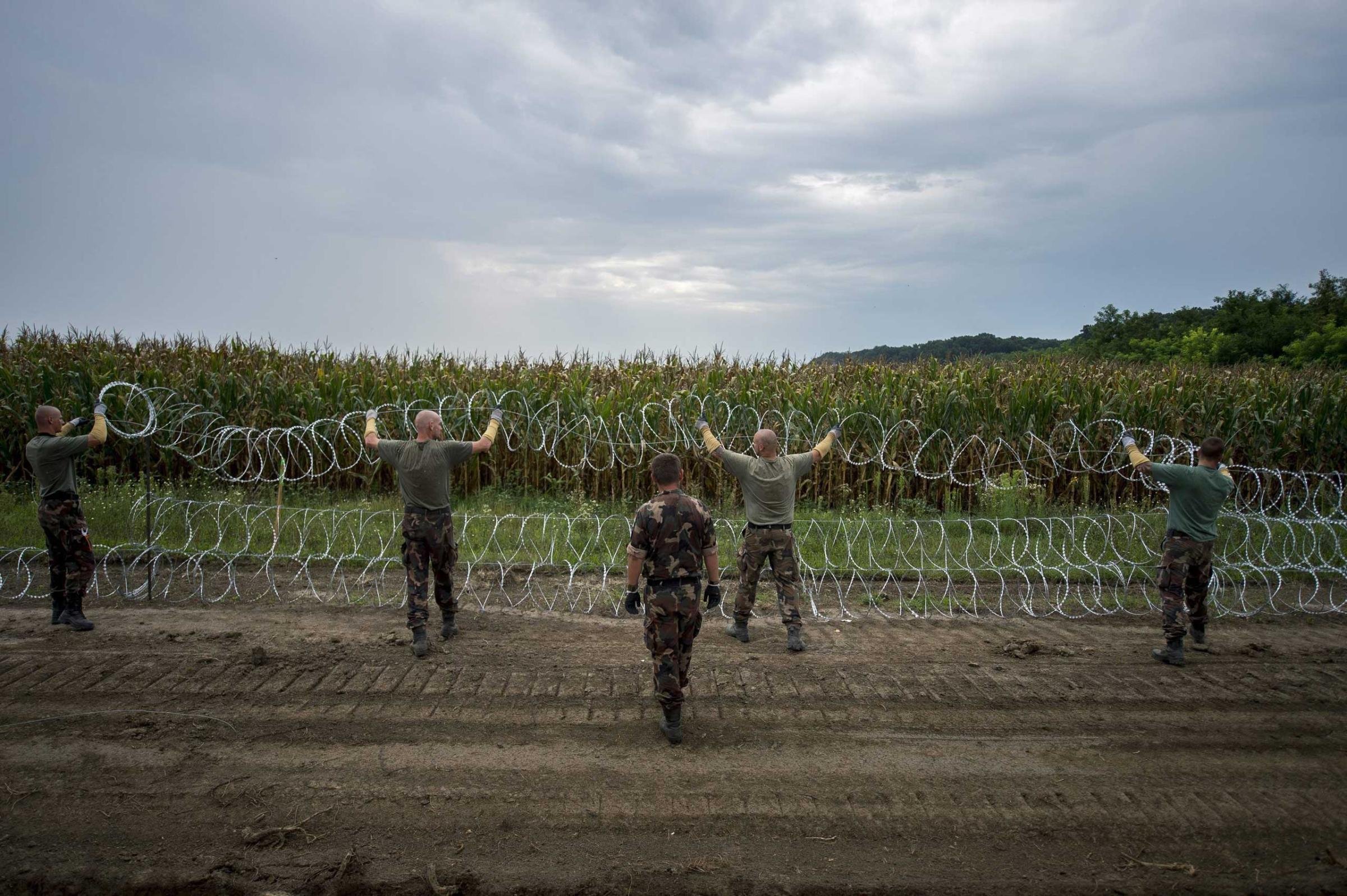 Hungary border fence migrants refugees