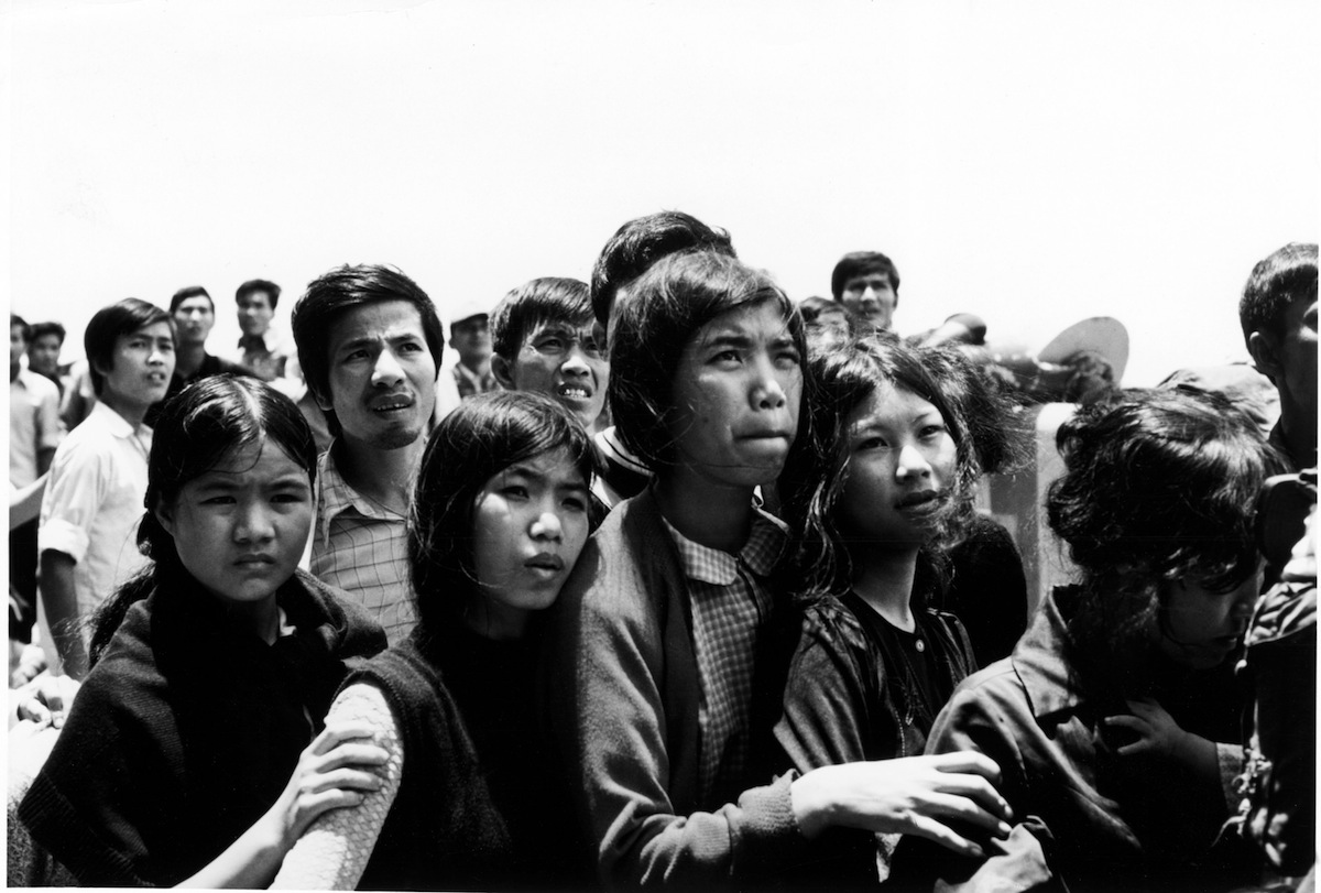 On April 23, 1975, North Vietnamese refugees who had left the region of Phan Rang were carried on board the Durham cargo ship on the China Sea to the merchant navy ship Transcolorado to reach the south. (Gamma-Keystone / Getty Images)
