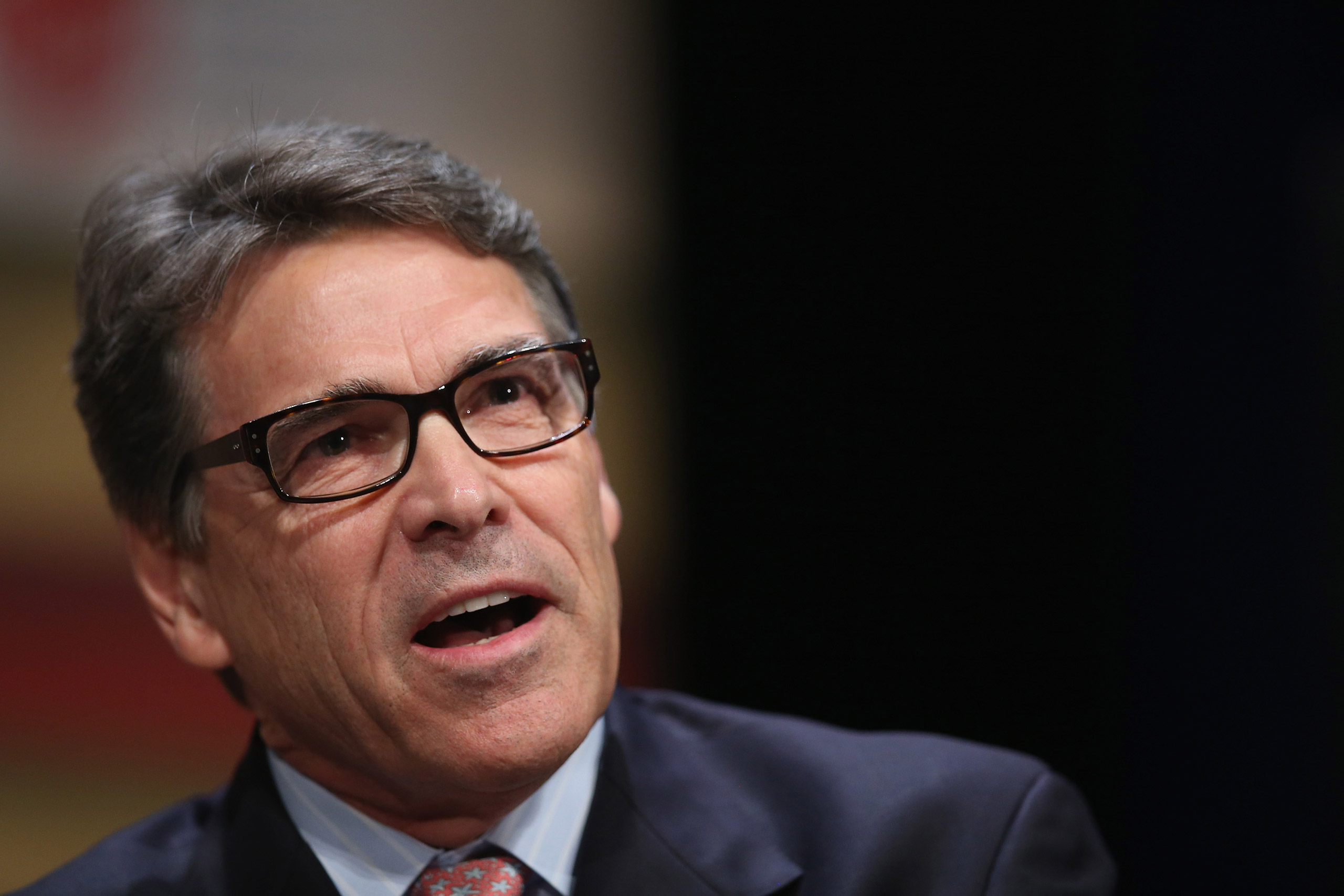 Former Texas Governor Rick Perry fields questions at The Family Leadership Summit at Stephens Auditorium in Ames, Iowa, on July 18, 2015. (Scott Olson—Getty Images)