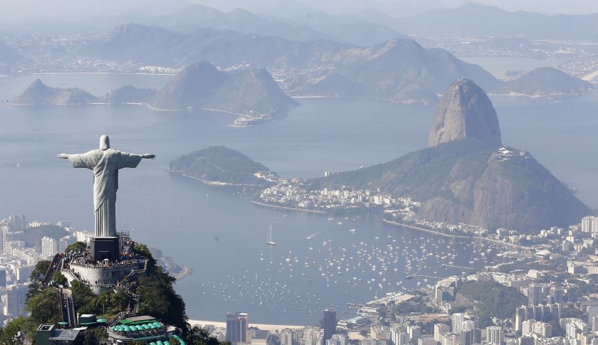 Tourists visit the Christ the Redeemer statue in Rio de Janeiro
