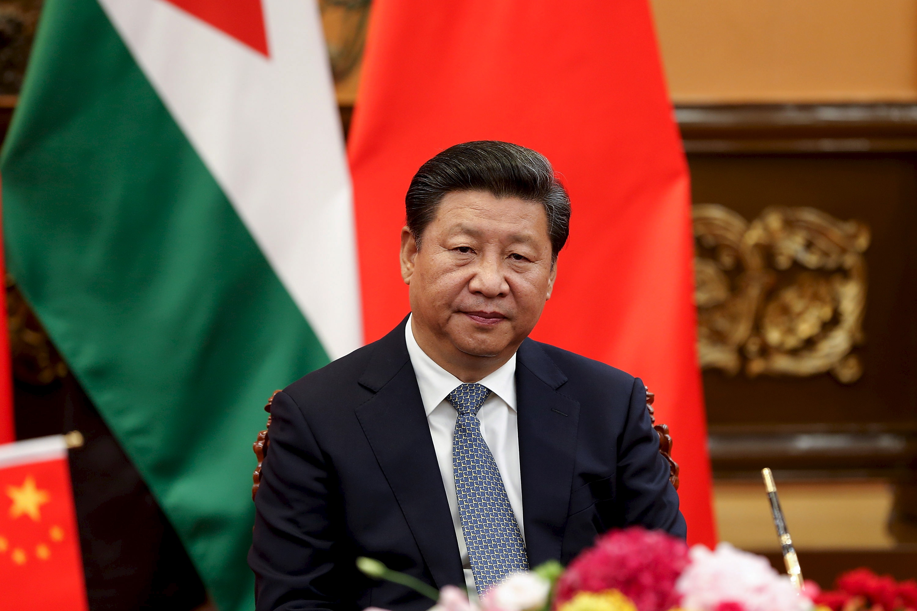 China's President Xi Jinping attends a signing ceremony with King of Jordan Abdullah II (not pictured) at he Great Hall of the People in Beijing on Sept. 9, 2015 (Lintao Zhang—Reuters)