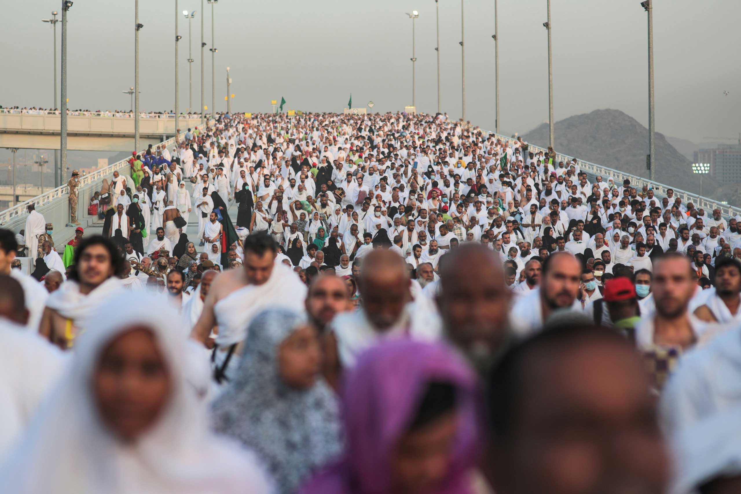 Hundreds of thousands of Muslim pilgrims make their way to cast stones at a pillar symbolizing the stoning of Satan, in a ritual called  Jamarat,  the last rite of the annual hajj, on the first day of Eid al-Adha, in Mina near the holy city of Mecca, on Sept. 24, 2015.
