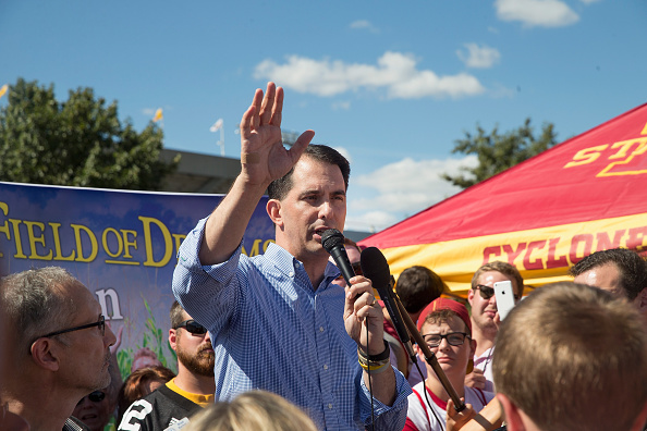 Republican presidential candidate, Wisconsin Gov. Scott Walker speaks to fans tailgating outside Jack Trice Stadium before the start of the Iowa State University versus University of Iowa football game on September 12, 2015 in Ames, Iowa. (Scott Olson—2015 Getty Images)