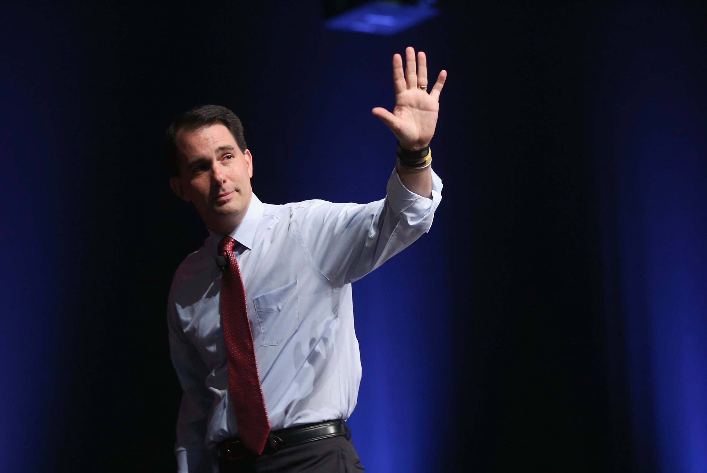 AMES, IA - JULY 18: Republican presidential candidate Wisconsin Governor Scott Walker greets guests at The Family Leadership Summit at Stephens Auditorium on July 18, 2015 in Ames, Iowa. According to the organizers, the purpose of The Family Leadership Summit is to inspire, motivate, and educate conservatives. (Photo by Scott Olson/Getty Images)