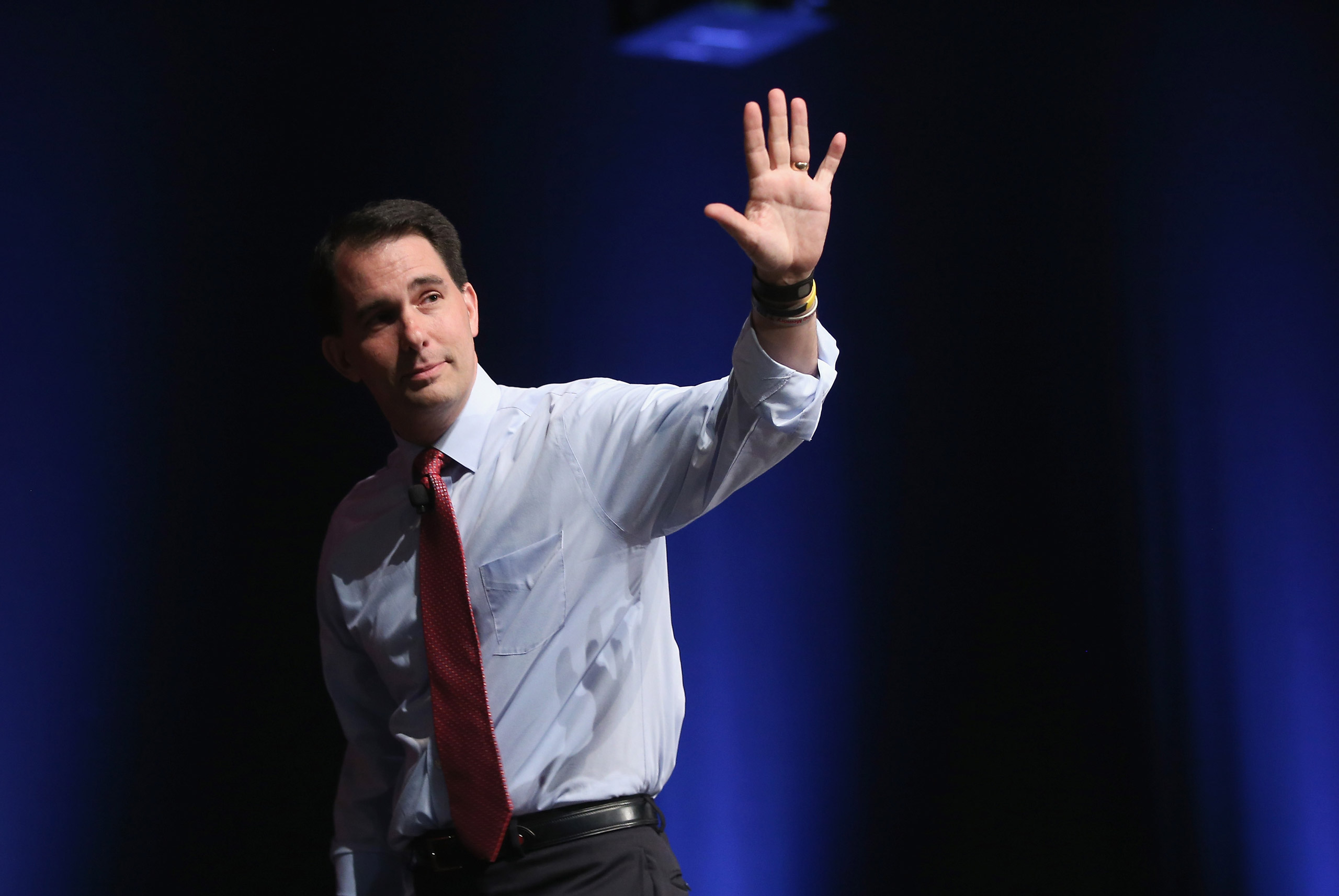 AMES, IA - JULY 18:  Republican presidential candidate Wisconsin Governor Scott Walker greets guests at The Family Leadership Summit at Stephens Auditorium on July 18, 2015 in Ames, Iowa. According to the organizers, the purpose of The Family Leadership Summit is to inspire, motivate, and educate conservatives.  (Photo by Scott Olson/Getty Images)
