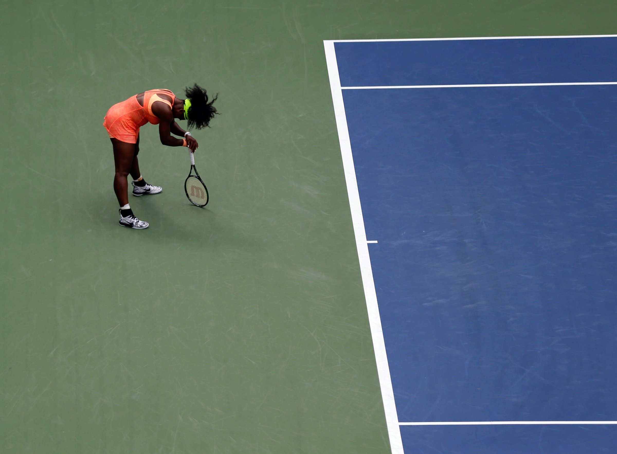 Serena Williams reacts after losing a point to Roberta Vinci, of Italy, during a semifinal match at the U.S. Open tennis tournament, Friday, Sept. 11, 2015, in New York. (AP Photo/Seth Wenig)