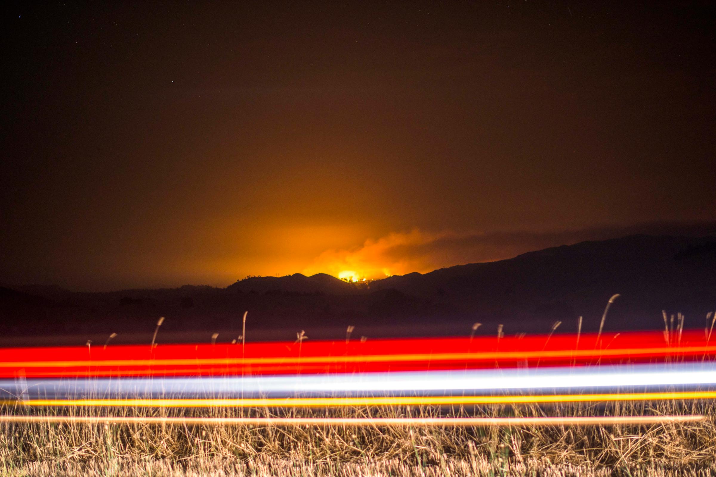 The Valley Fire burns off Highway 128 Sunday evening. Valley Fire in Lake and Sonoma Counties Sunday September 13th, 2015. As of Sunday evening the fire had burned over 50,000 acres and was 0% contained. The Associated Press reported that at least one person was killed due to the fire.