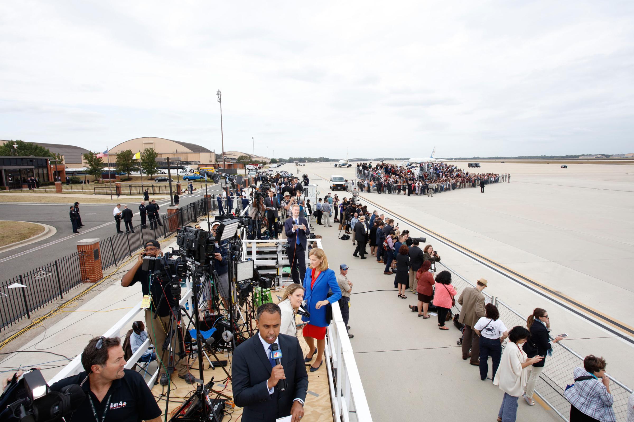 Members of the media await the arrival of Pope Francis at Andrews Air Force Base, Md., Tuesday, Sept. 22, 2015.Washington, D.C. Photograph by Tobias Hutzler for TIME