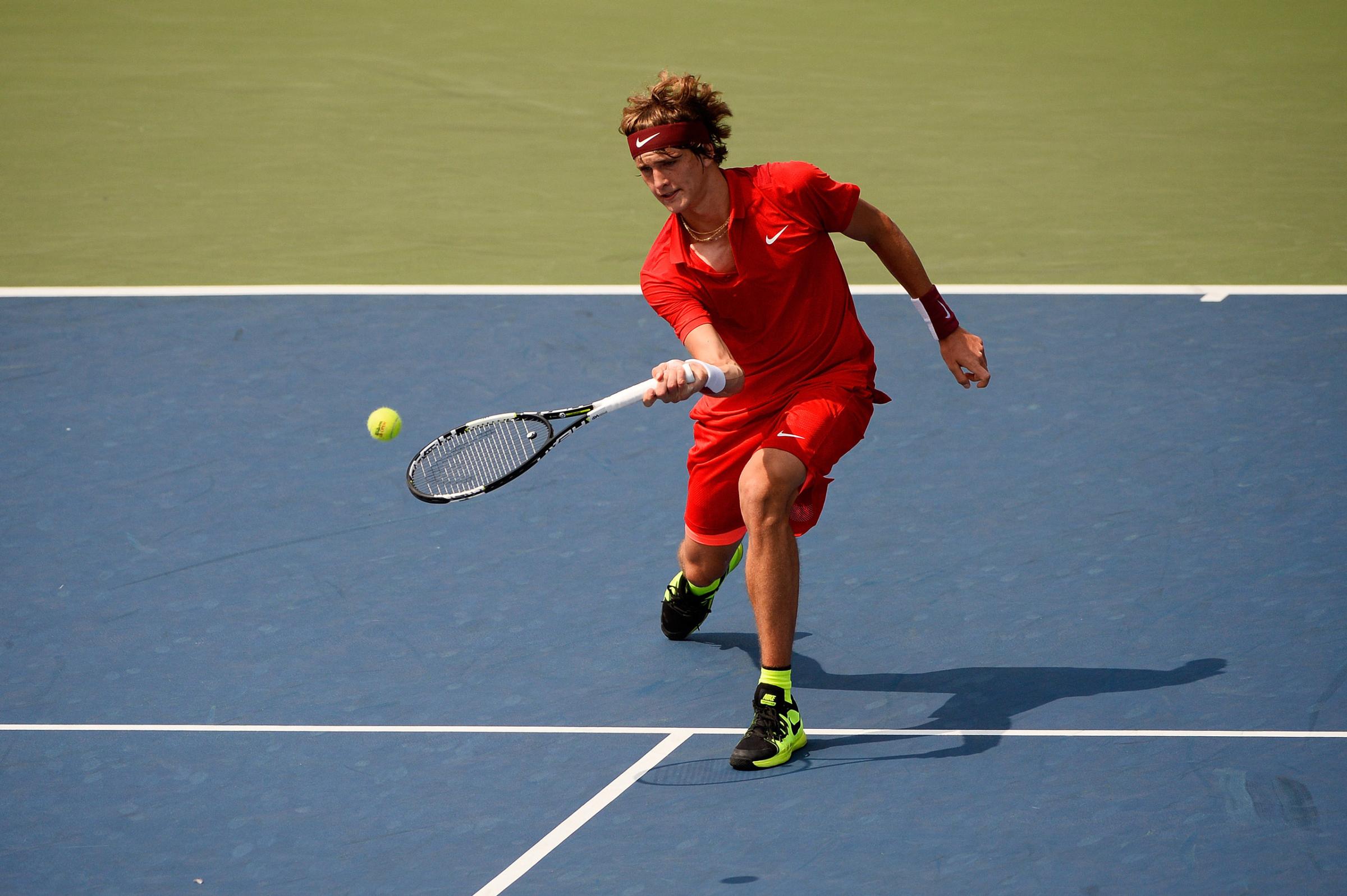 NEW YORK, NY - SEPTEMBER 01: Alexander Zverev of Germany returns a shot against Philipp Kohlschreiber of Germany during their Men's Singles First Round match on Day Two of the 2015 US Open at the USTA Billie Jean King National Tennis Center on September 1, 2015 in the Flushing neighborhood of the Queens borough of New York City. (Photo by Alex Goodlett/Getty Images)NEW YORK, NY - SEPTEMBER 01: Alexander Zverev of Germany returns a shot against Philipp Kohlschreiber of Germany during their Men's Singles First Round match on Day Two of the 2015 US Open at the USTA Billie Jean King National Tennis Center on September 1, 2015 in the Flushing neighborhood of the Queens borough of New York City. (Photo by Alex Goodlett/Getty Images)
