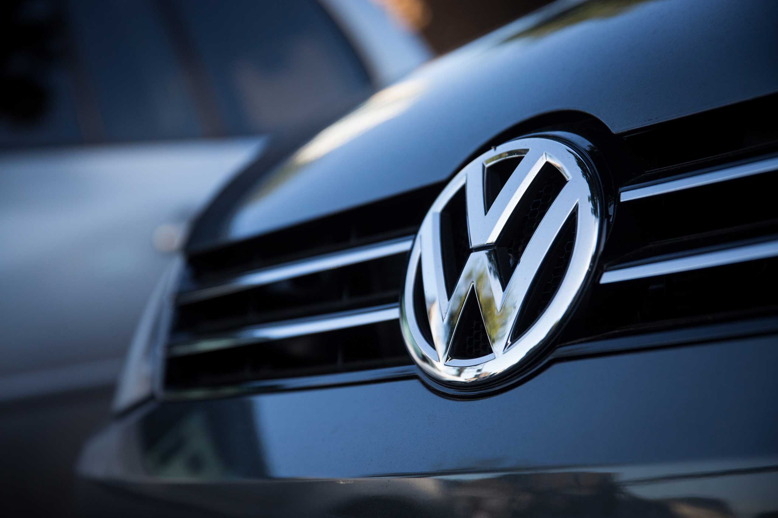 Used cars by German manufacturer Volkswagen are parked at a dealership in London, on Sept. 25, 2015 (Rob Stothard—Getty Images)