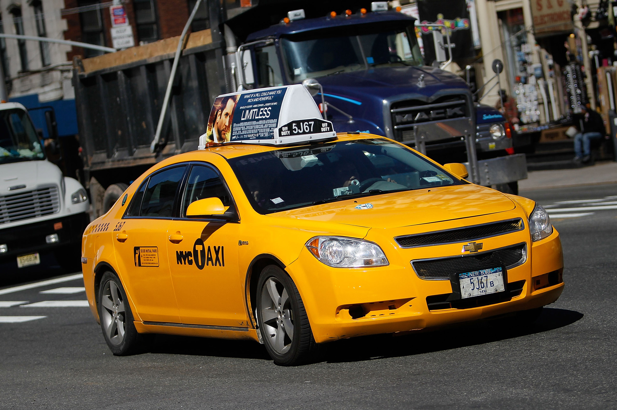 A gas-electric hybrid taxi drives on a street on March 1, 2011 in New York City. In May 2007, New York City Mayor Michael Bloomberg proposed a five-year plan to switch New York City's taxicabs to more fuel-efficient hybrid vehicles. However, the plan was dropped after operators complained that the cost of maintaining the new cars outweighed the fuel savings. Today, New York City has around 4,300 hybrid taxis, representing almost 33 percent of the 13,237 taxis in service—the most in any city in North America.