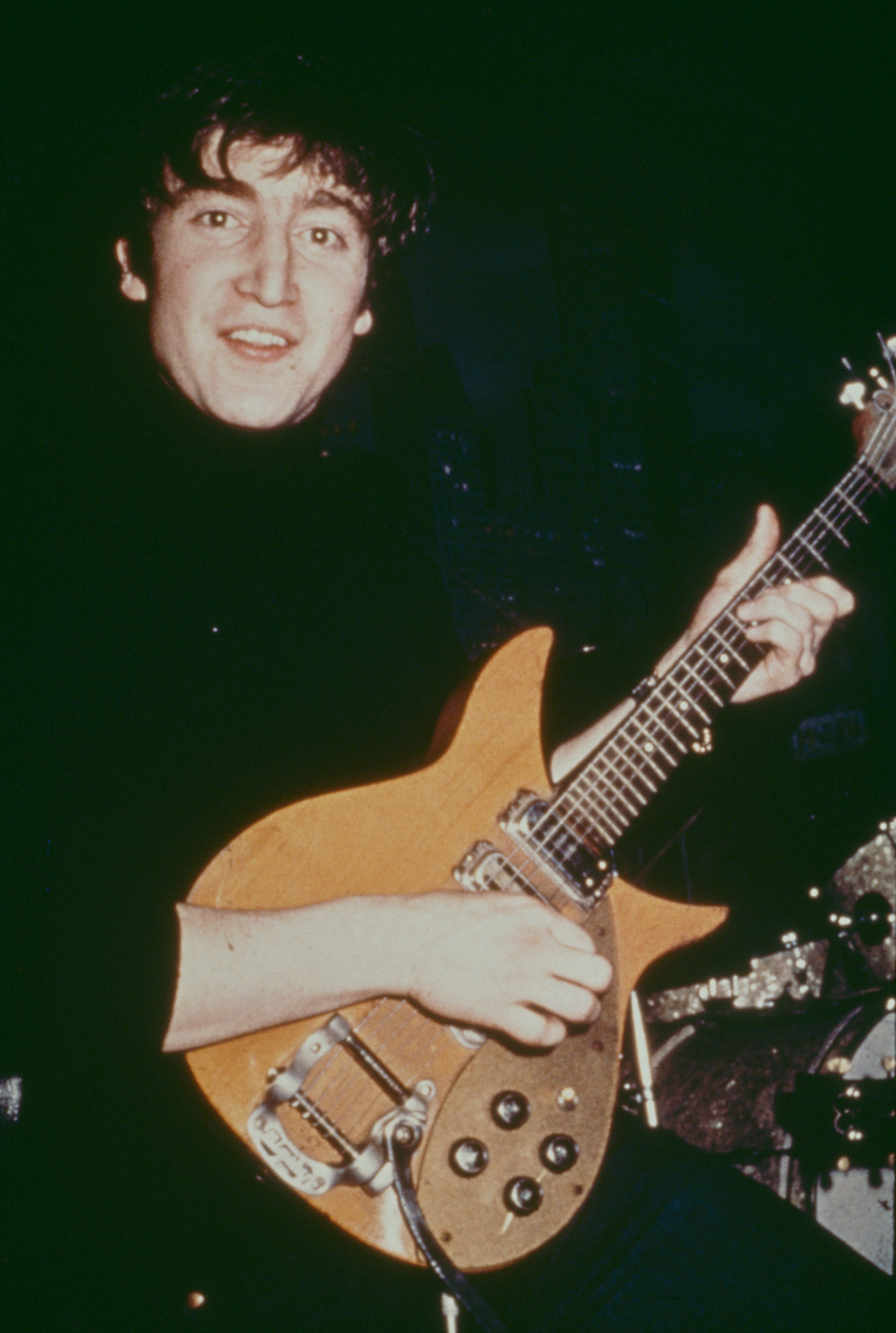 John Lennon performing with The Beatles at the Star Club, Hamburg, April-May 1962.