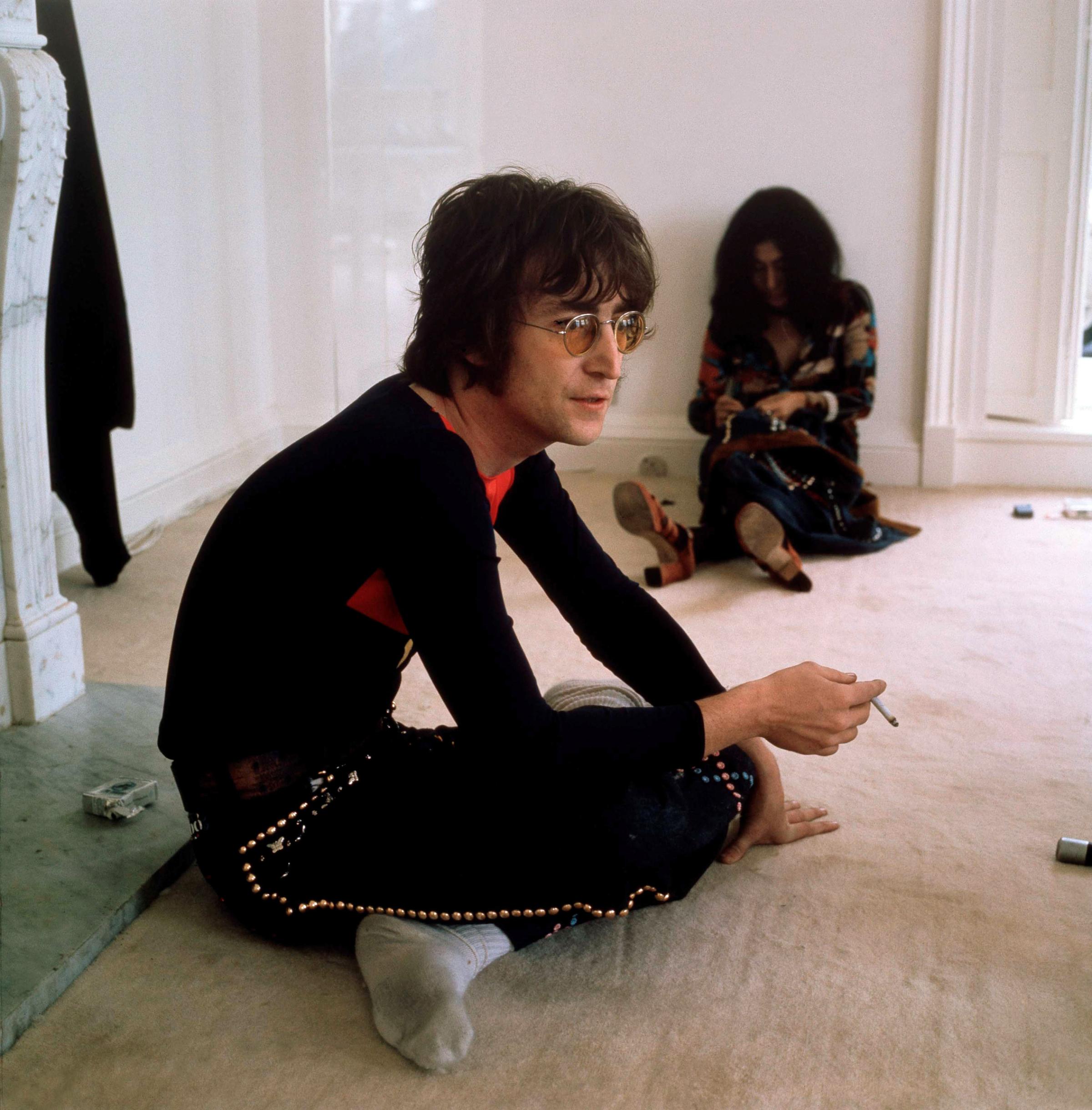 Former Beatle John Lennon with his wife Yoko Ono at his home, Tittenhurst Park, near Ascot, Berkshire, July 1971.
