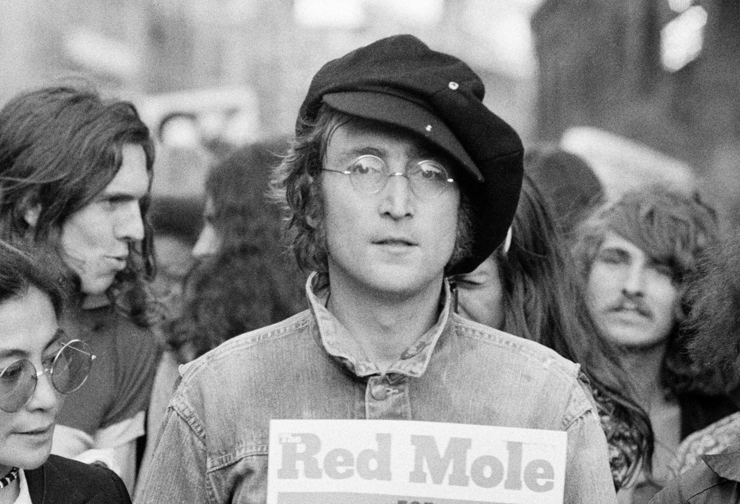 John Lennon and Yoko Ono (extreme left) as they attend a rally in Hyde Park, London, England, 1975.