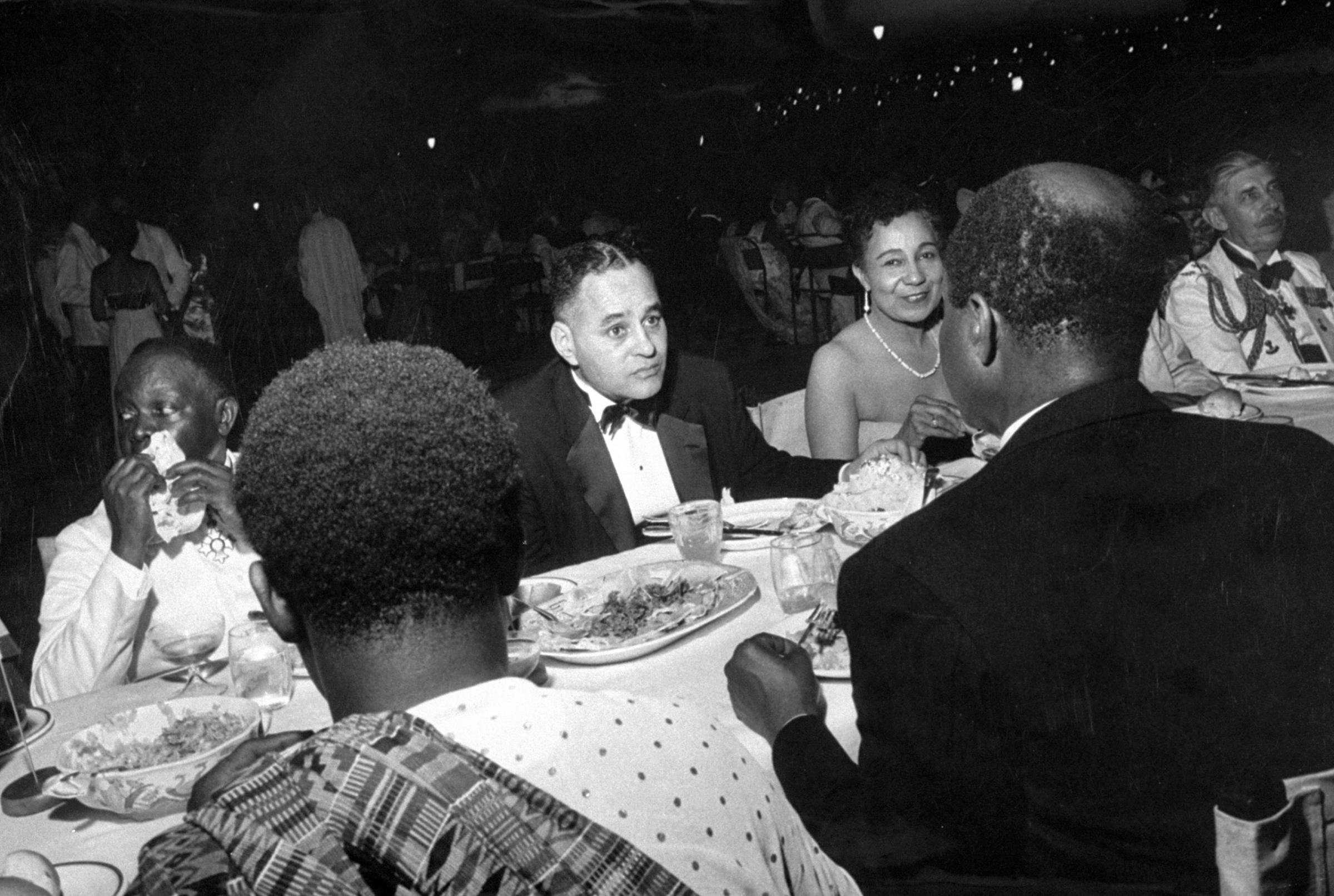 Dr. Ralph J. Bunche (C) attending the Ghana independence ceremonies, 1957.