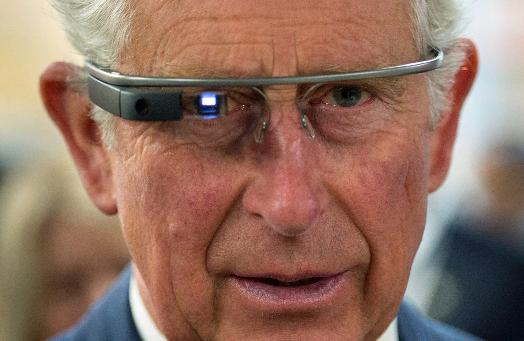 Prince Charles tries on Google Glass in Winnipeg on May 21, 2014.