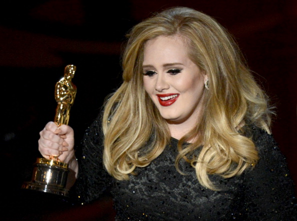 Singer Adele Adkins accepts the Best Original Song award for Skyfall from "Skyfall" onstage during the Oscars held at the Dolby Theatre on February 24, 2013 in Hollywood, California (Kevin Winter—Getty Images)