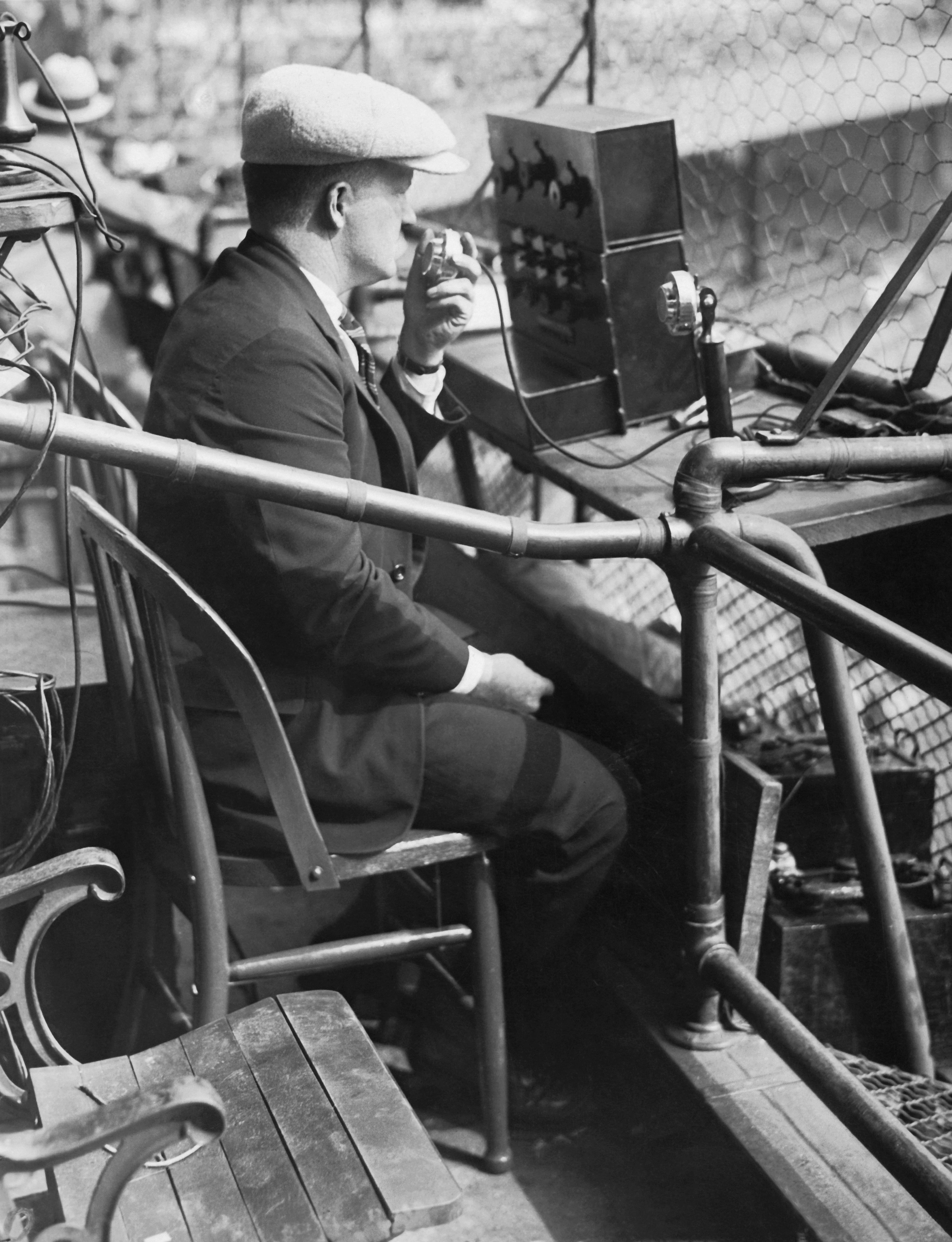 An AT&amp;T engineer tests out an equipment for broadcasting the third game of the 1924 World Series at the Polo Grounds in New York City on Oct. 6, 1924. (Underwood Archives/Getty Images)