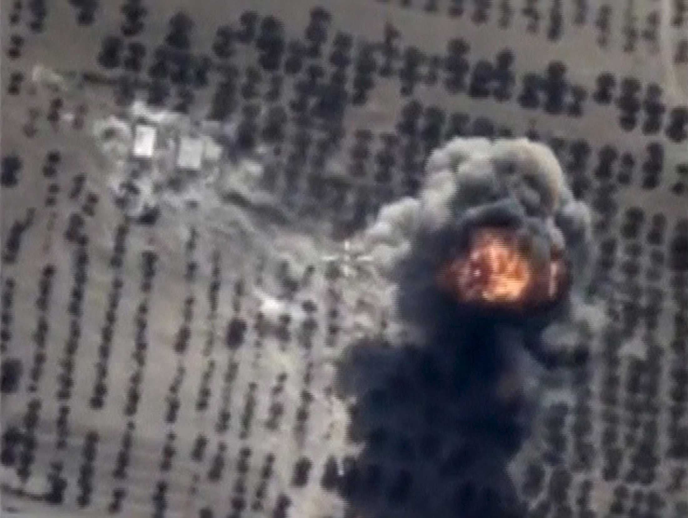 Frame grab taken from Russia's Defence Ministry footage shows explosion after airstrikes carried out by Russian air force in Idlib province, Syria