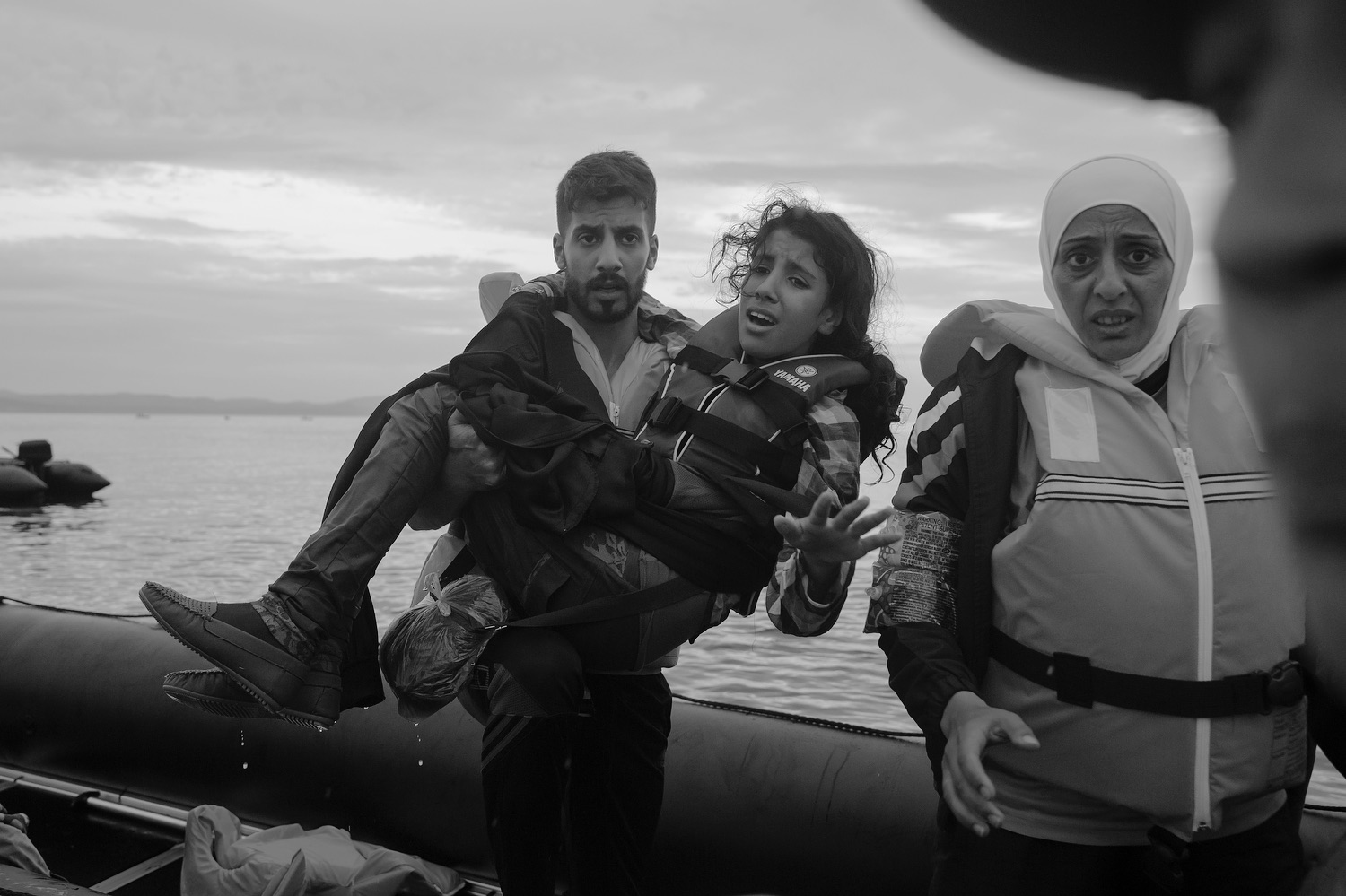 Refugees from Syria, Afghanistan, Pakistan, Somalia cross the sea between Turkey and Greece by means of inflatable pontoon rafts to the island of Lesbos as the first step in making their way across Europe.by James Nachtwey