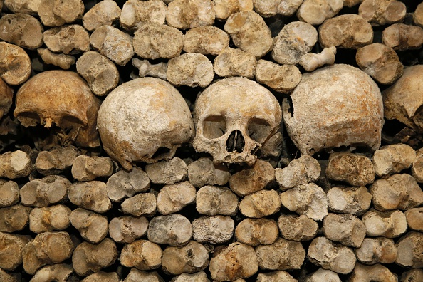 Skulls and bones are stacked at the Catacombs of Paris on October 14, 2014 (Patrick Kovarick—AFP/Getty Images)