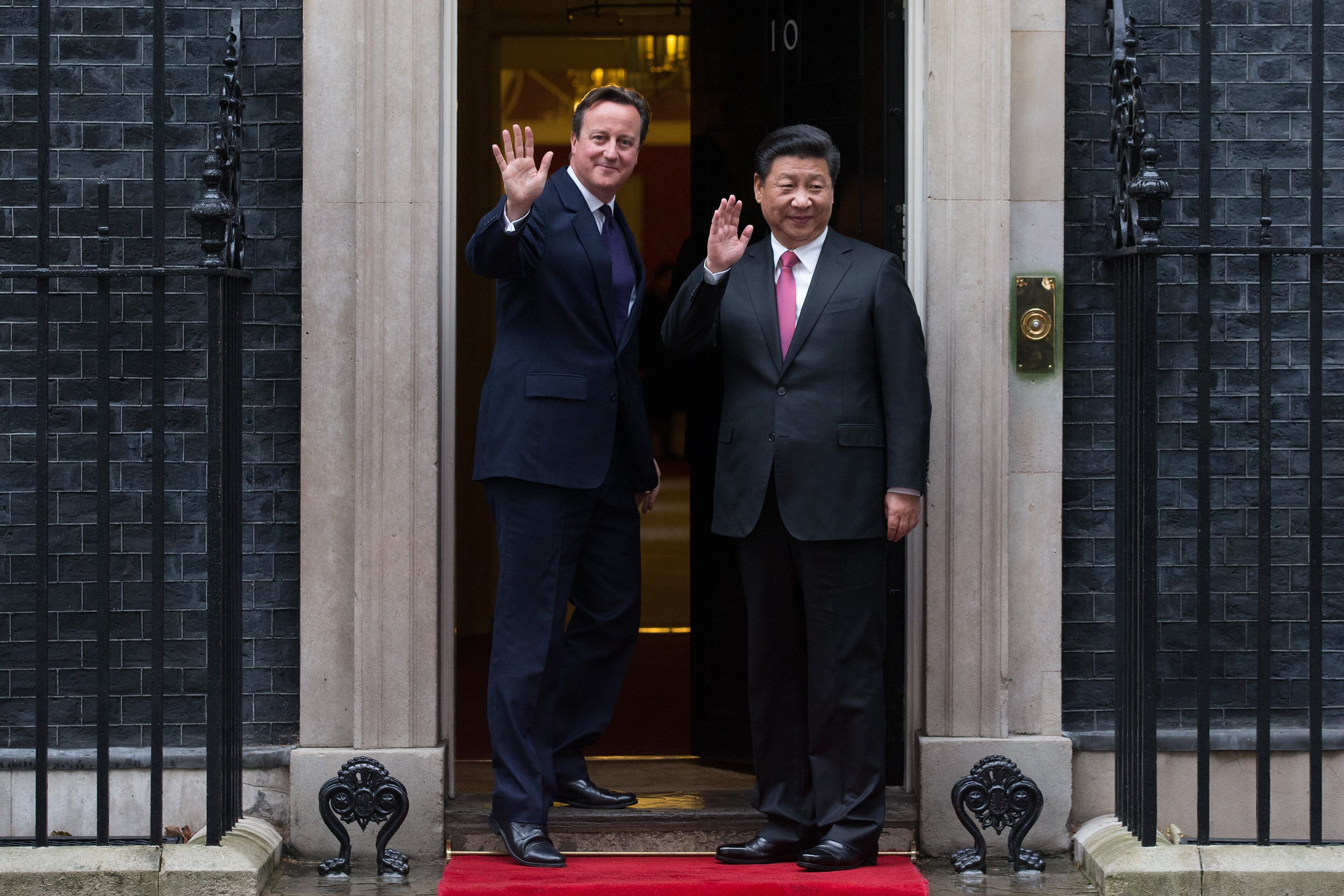 David Cameron greets Xi Jinping as he arrives in Downing Street on Oct. 21, 2015 in London. (Carl Court—Getty Images)