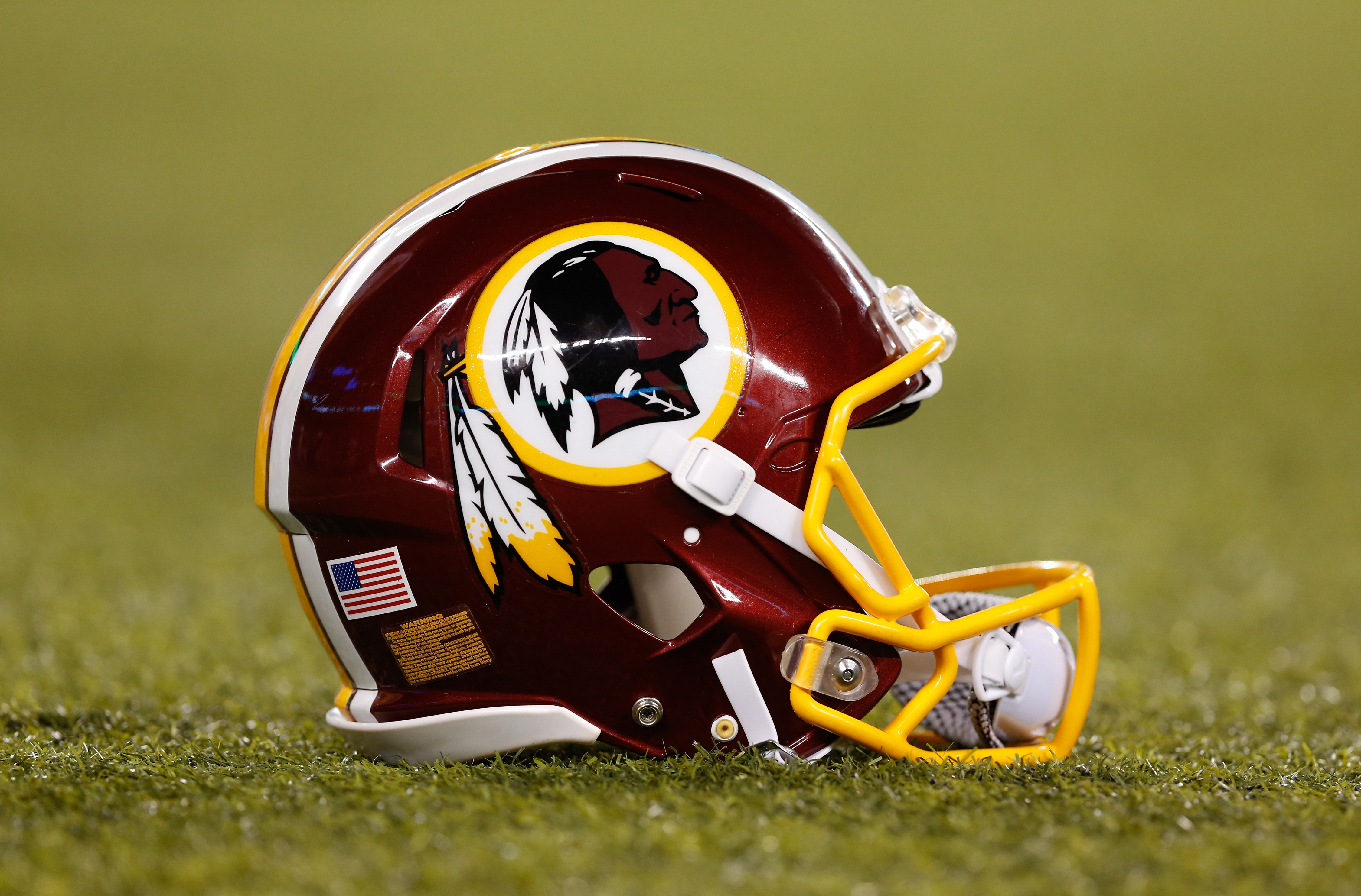 A detail view of a Washington Redskins helmet. California Governor Jerry Brown signed a bill into law Sunday banning public schools from using the term "Redskins" as a team name or mascot. (Aaron M. Sprecher—AP)