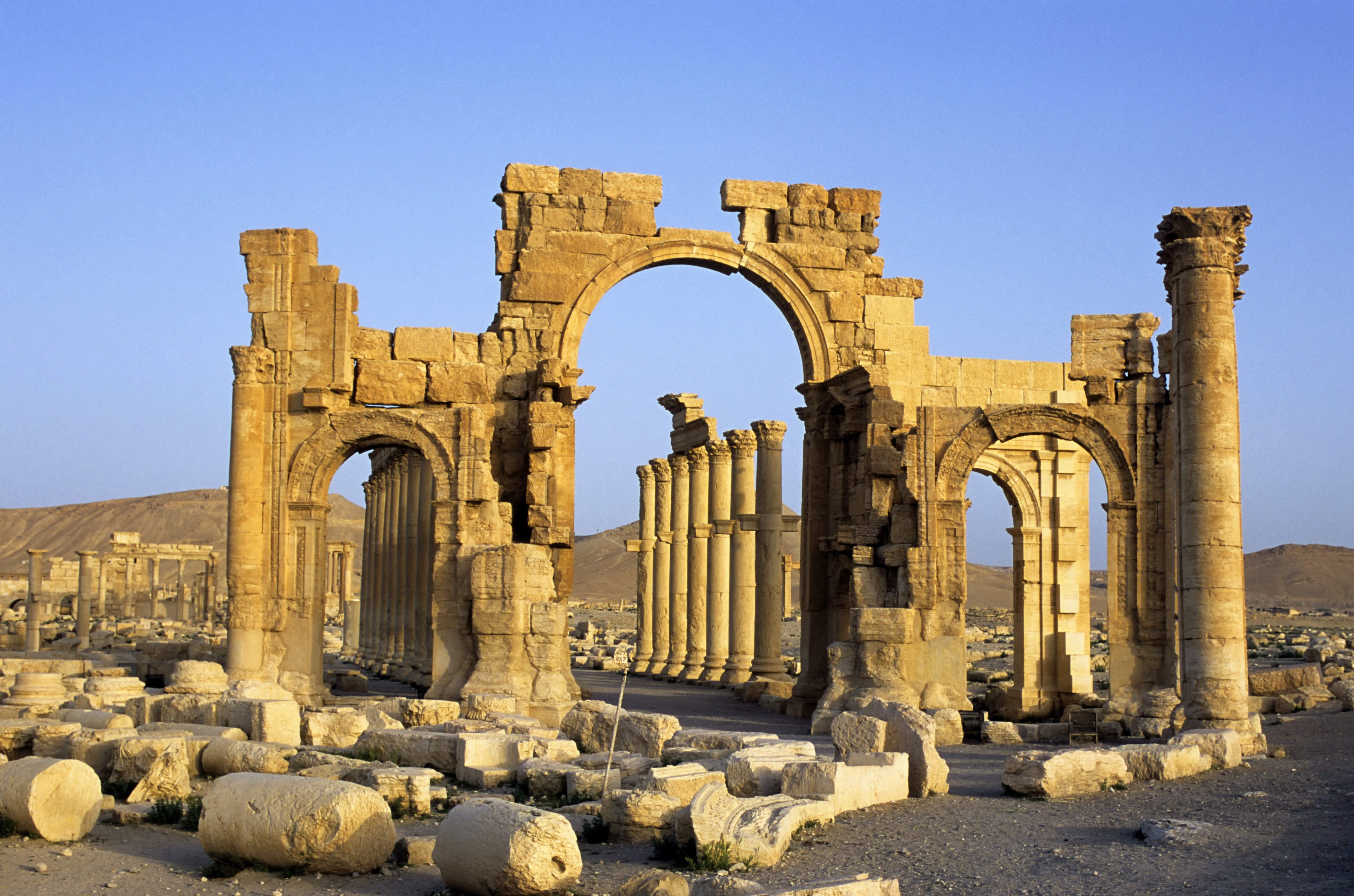 Syria, Palmyra, Ancient Roman City, Triumphal Arch And Colonnaded Street on Jan. 1, 2001. (Wolfgang Kaehler—LightRocket/Getty Images)