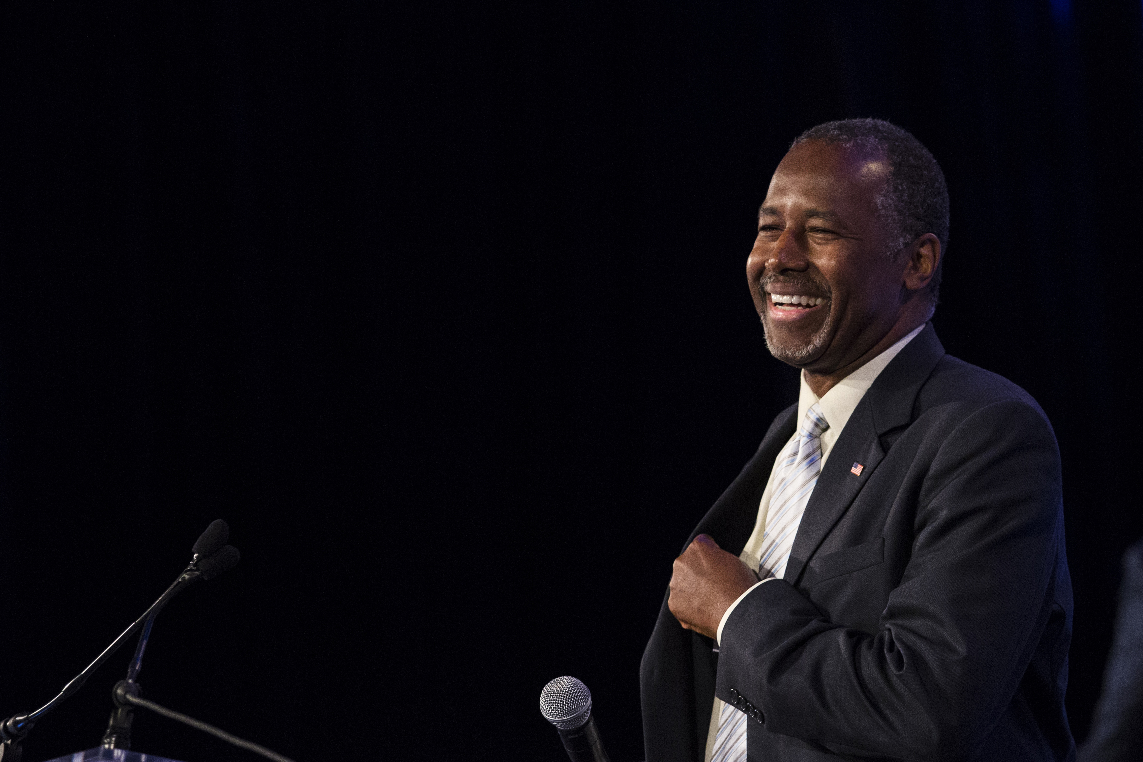 Ben Carson, 2016 Republican presidential candidate, smiles while arriving onstage to speak during the Values Voter Summit on Sept. 25, 2015 in Washington, D.C.