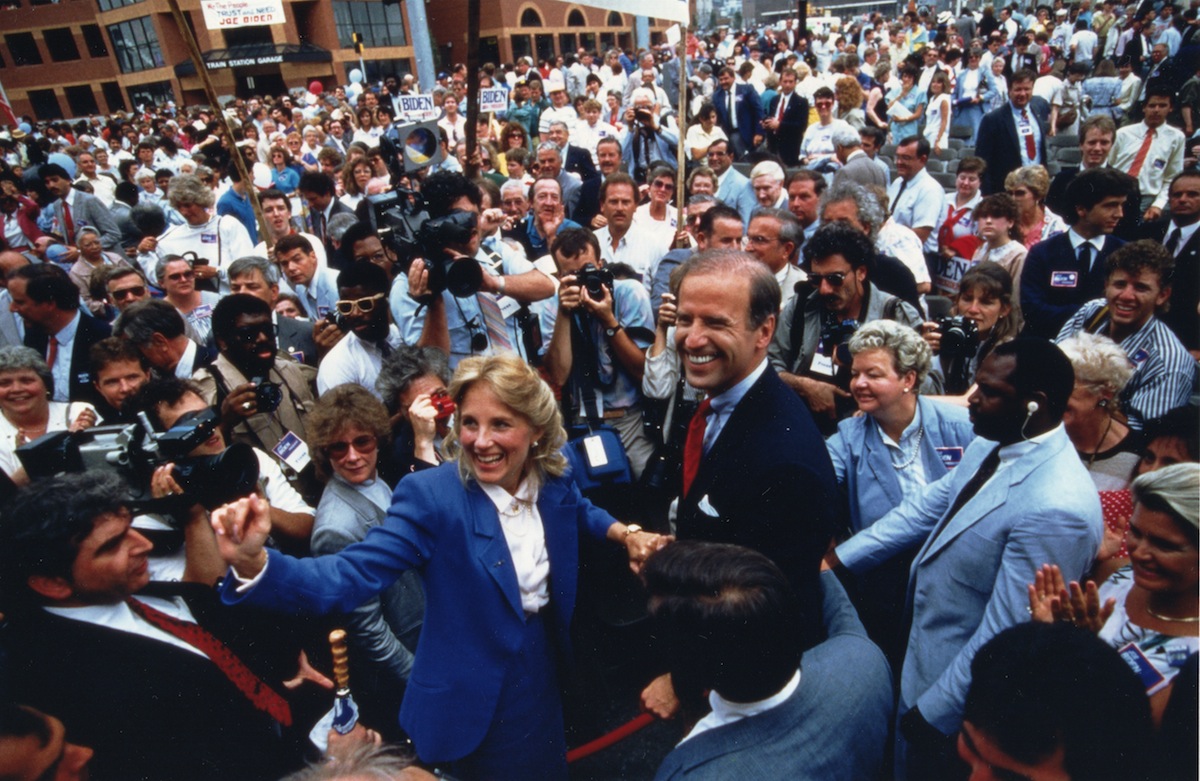 Senator Joseph Biden of Delaware and his wife, Jill, are surrounded by supporters and representatives of the news media at a rally, Wilmington, Delaware, 1988. (PhotoQuest/Getty Images)