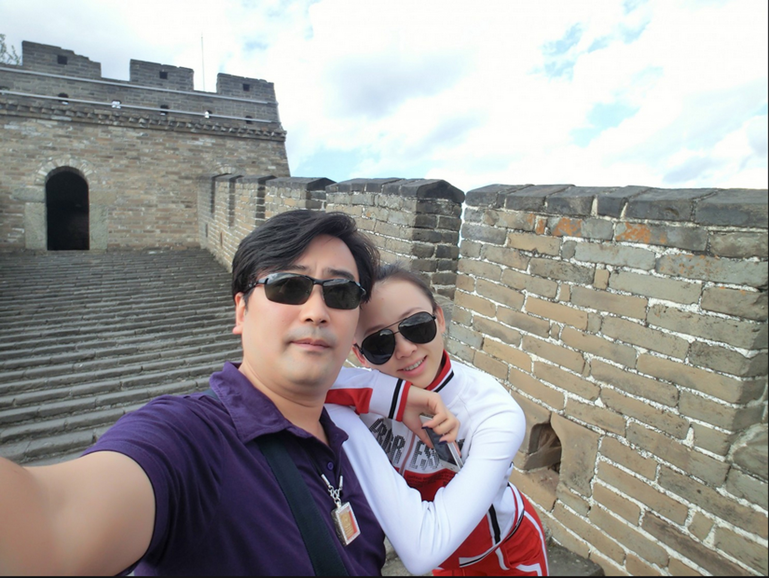 Fan Yue, left, and Ji Yingnan, right, are seen in a selfie taken on the Great Wall of China. Ji released images online after realizing Fan was married. (Courtesy of Ji Yingnan)