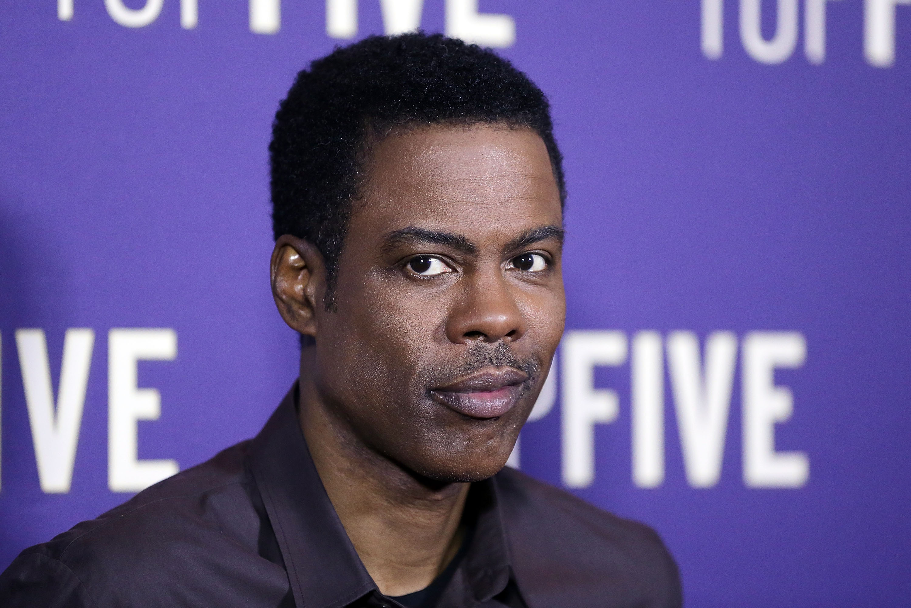 Chris Rock arrives at the "Top Five" special screening on March 4, 2015 in Sydney, Australia. (Mark Metcalfe—Getty Images)