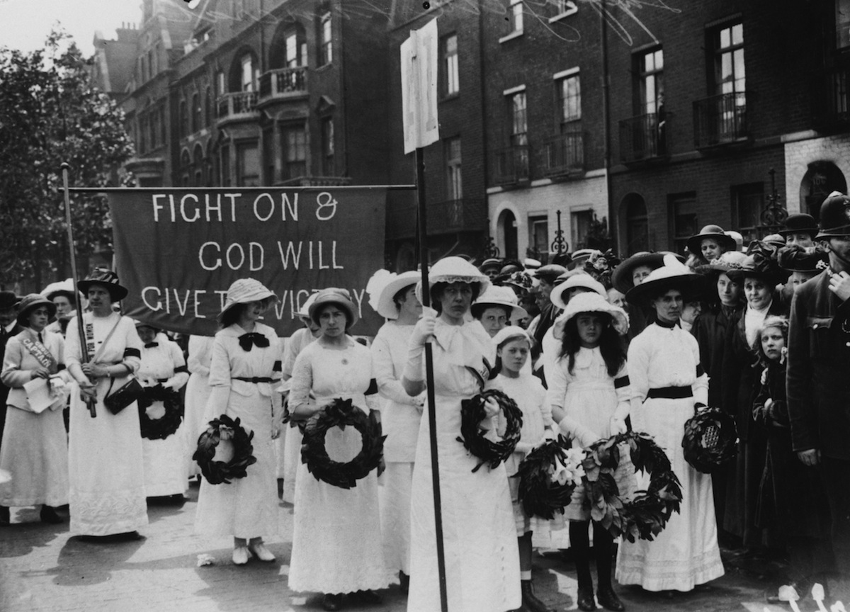 Suffragettes, wearing black armbands, in the funeral procession of English suffragette Emily Davison in London on June 14, 1913. (Hulton Archive / Getty Images)