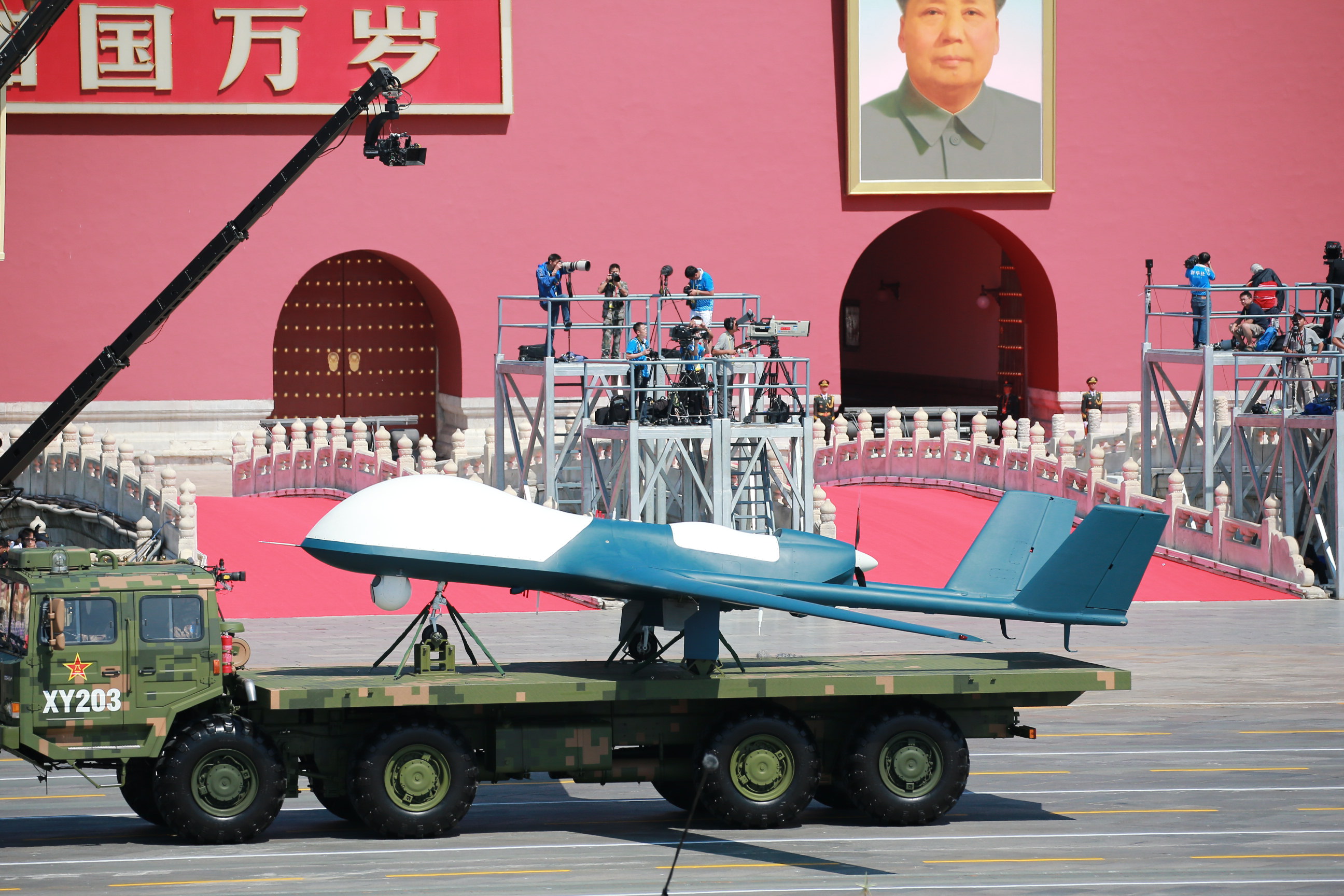 A military vehicle carrying a Wing Loong drone marches past the Tiananmen Rostrum in Beijing, China on Sept. 3 2015. (AP)