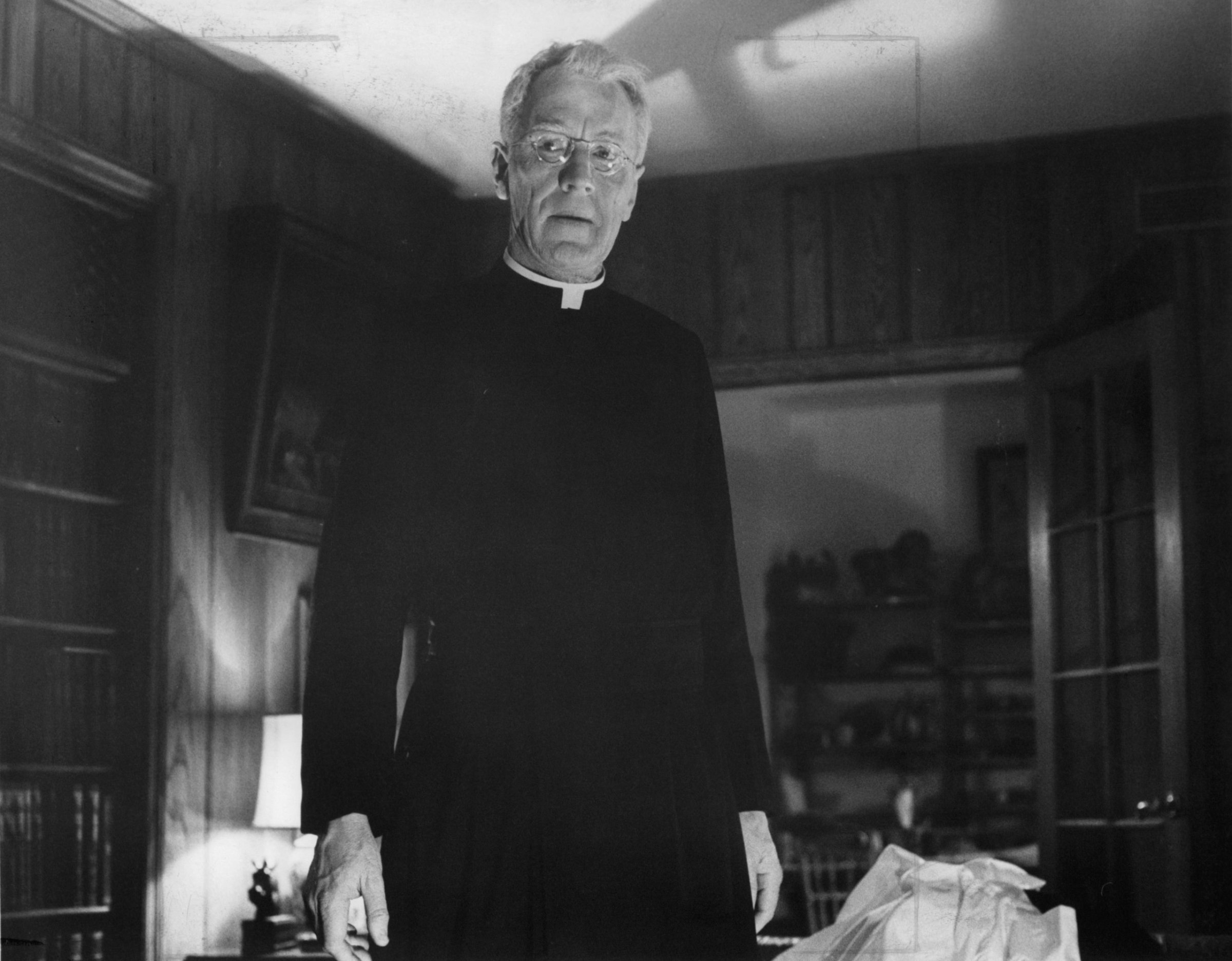 Max Von Sydow stands in priest uniform in a scene from the film 'The Exorcist', 1973. (Photo by Warner Brothers/Getty Images)