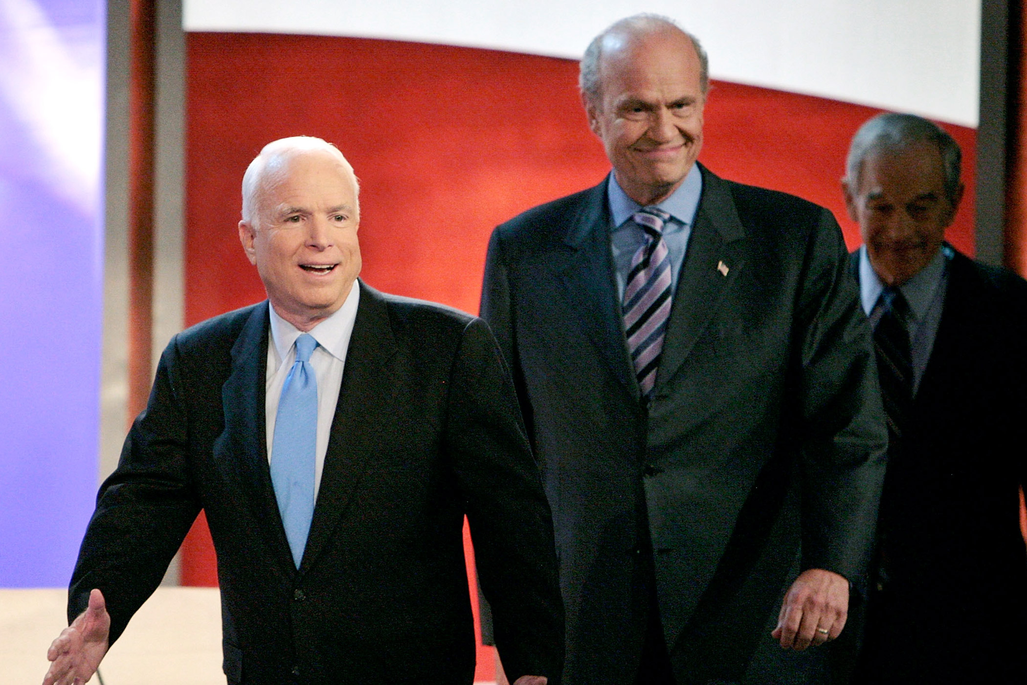 Republican presidential hopefuls Sen. John McCain (R-AZ), left, and U.S. Sen. Fred Thompson (R-TN), take the stage to participate in a  debate on Jan. 5, 2008 in Manchester, N.H.