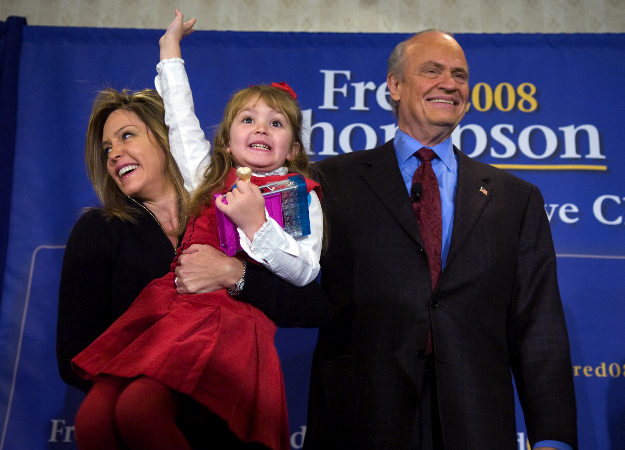 Republican presidential candidate, Fred Thompson is joined on stage by his wife, Jeri, holding 4-year-old daughter Hayden, before speaking to supporters on Caucus Day in Des Moines, Iowa, on Jan. 3, 2008.