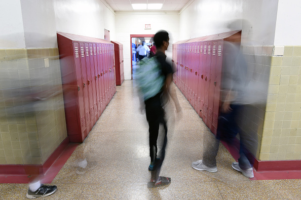 WASHINGTON, DC - JUNE 15: Roosevelt High School students and others walk through hallways on Monday June15, 2015 in Washington, DC. Mobility of students in D.C. public schools has become widespread. (Photo by Matt McClain/ The Washington Post via Getty Images) (The Washington Post&mdash;The Washington Post/Getty Images)