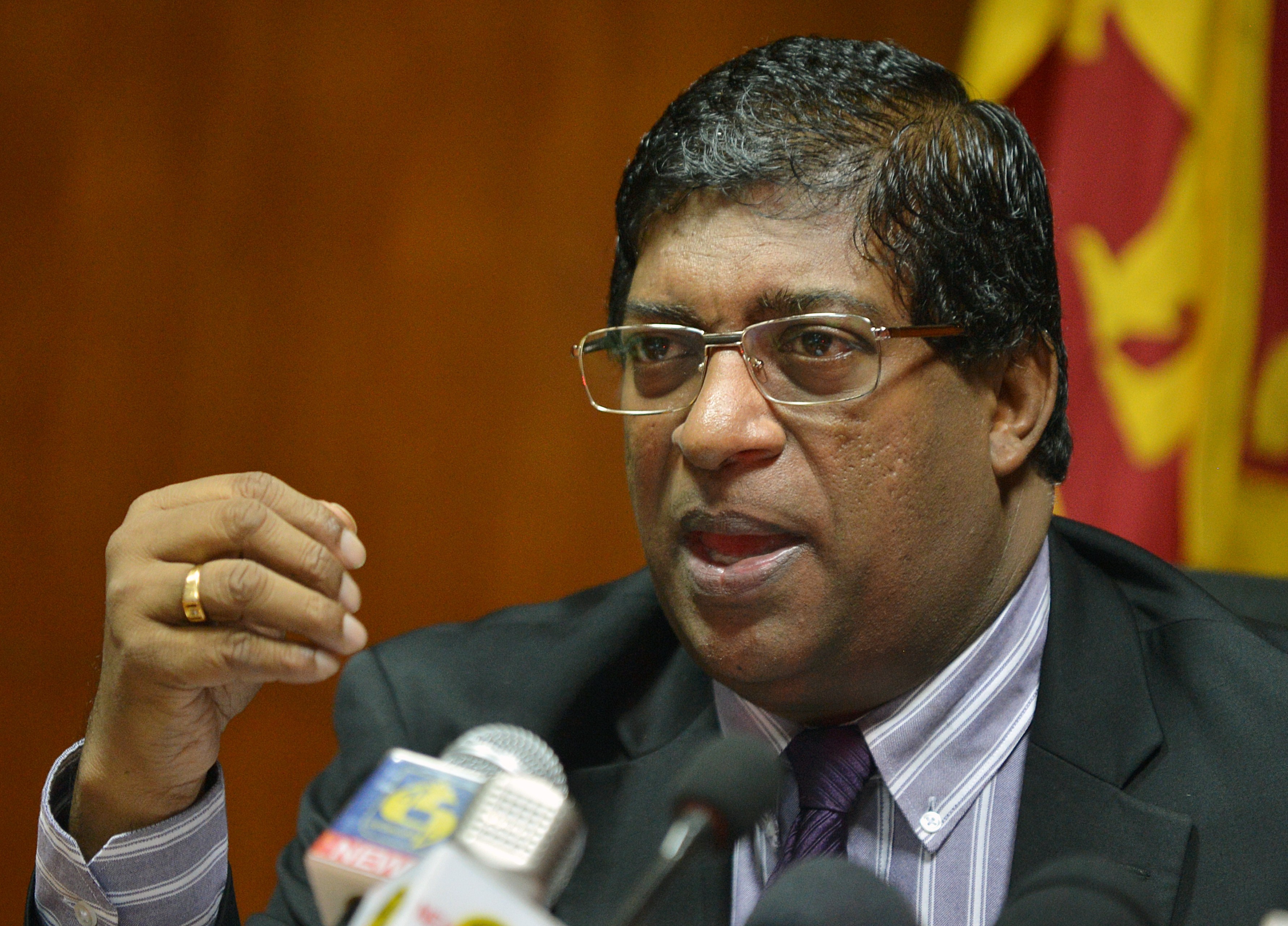 Sri Lanka's Finance Minister Ravi Karunanayake speaks to reporters in Colombo, Sri Lanka, on July 15, 2015 (Ishara S. Kodikara—AFP/Getty Images)